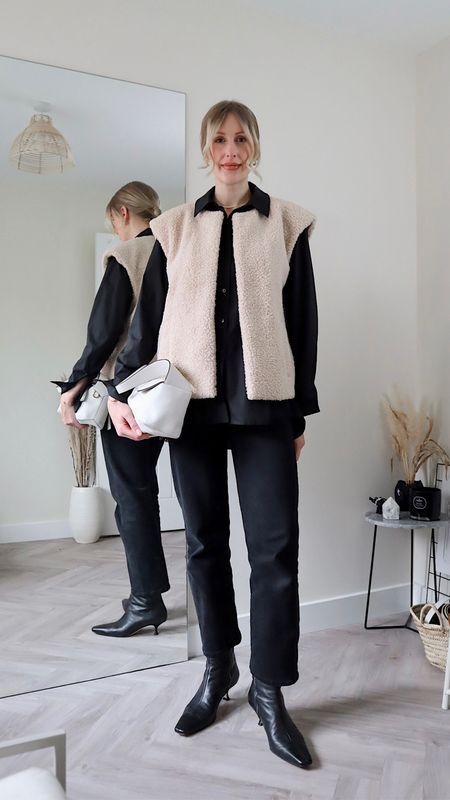 Shearling gilet outfit:
- River Island Borg gilet (M) - black version linked and alternatives 
- Levi’s Ribcage black jeans 
- black shirt (old) linked similar
- COS ankle boots (sold out) linked similar
- LOEWE hobo puzzle bag 

Smart casual look for the office 

#shearling #gilet 

#LTKitbag #LTKworkwear #LTKstyletip