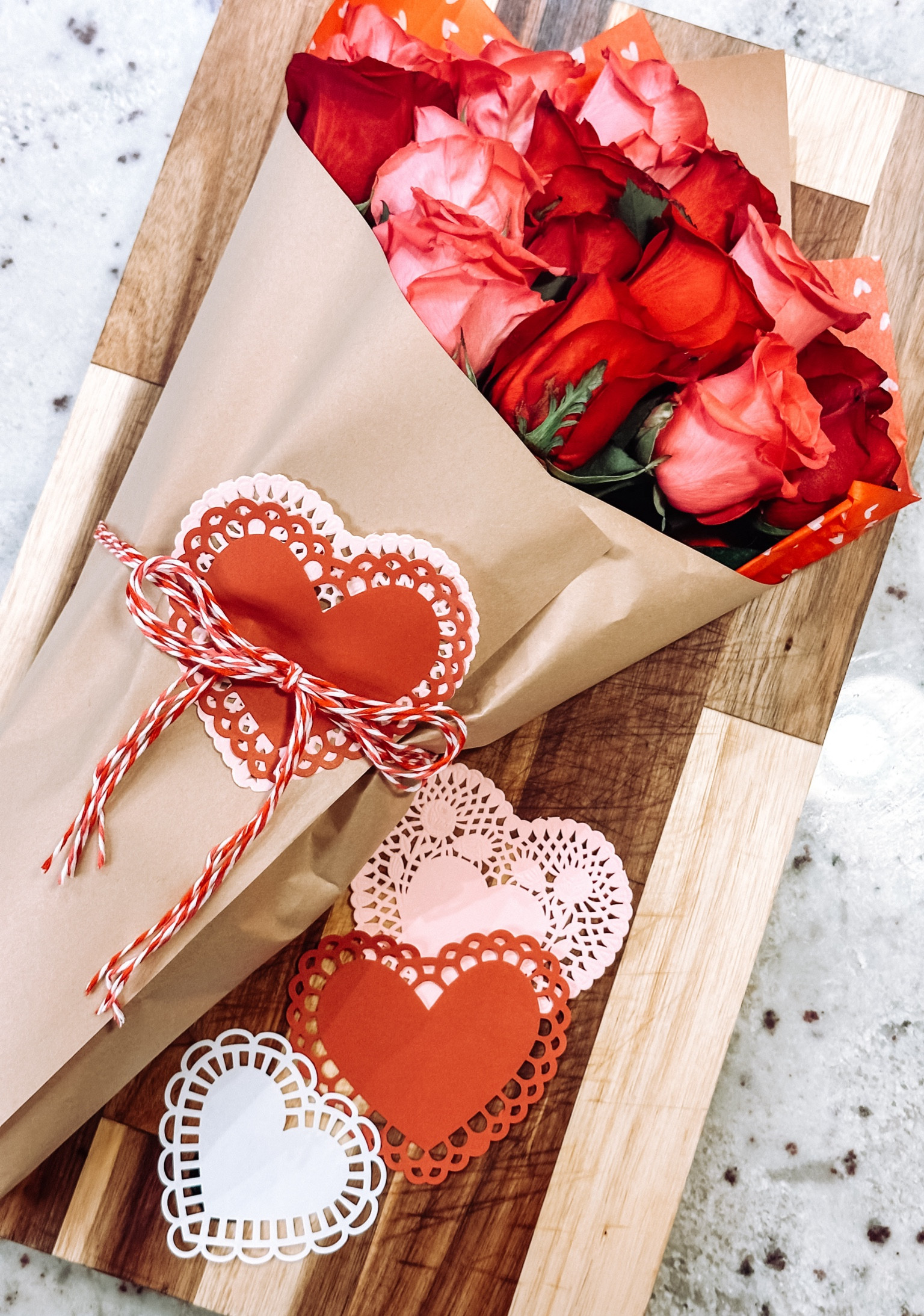 Craft paper, tissue paper, colored twine, and doilies are an easy way to turn your store bought flowers into a beautiful Valentines bouquet! 

#LTKparties #LTKSeasonal #LTKhome