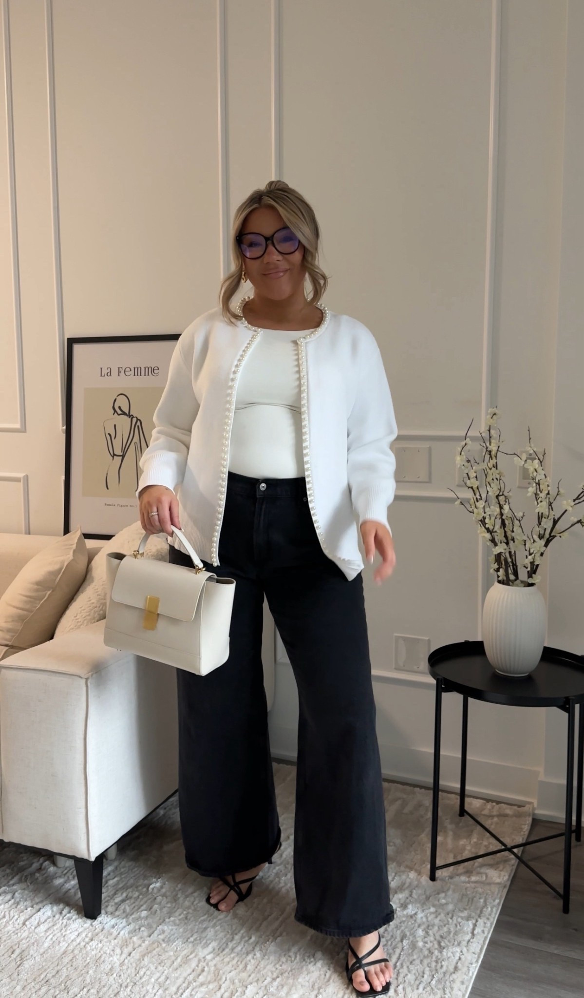 Black wide leg denim, white and gold cross body handbag 

#LTKcurves #LTKplussize #LTKmidsize