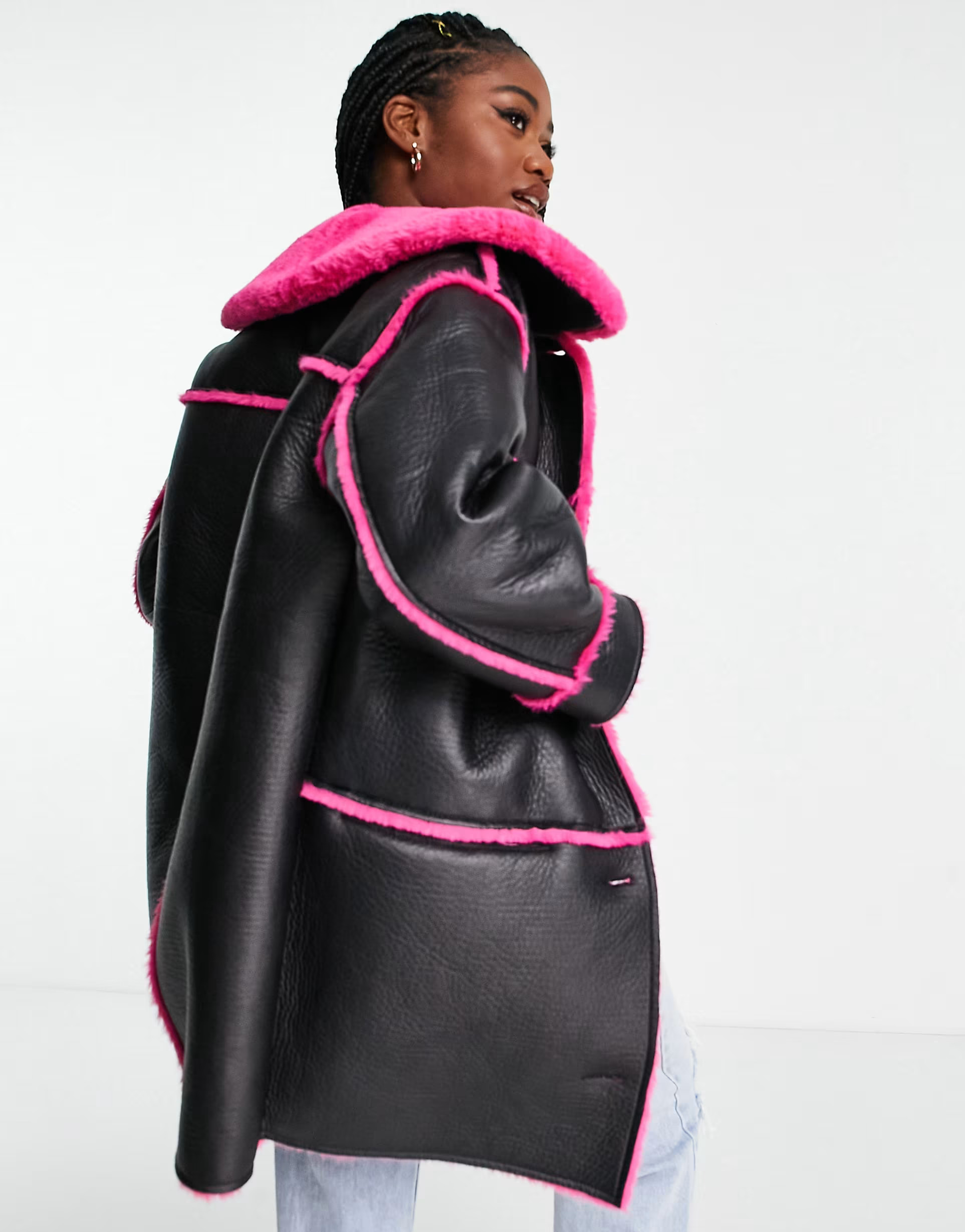 Miss Selfridge contrast faux fur faux leather long line coat in black with pink | ASOS (Global)