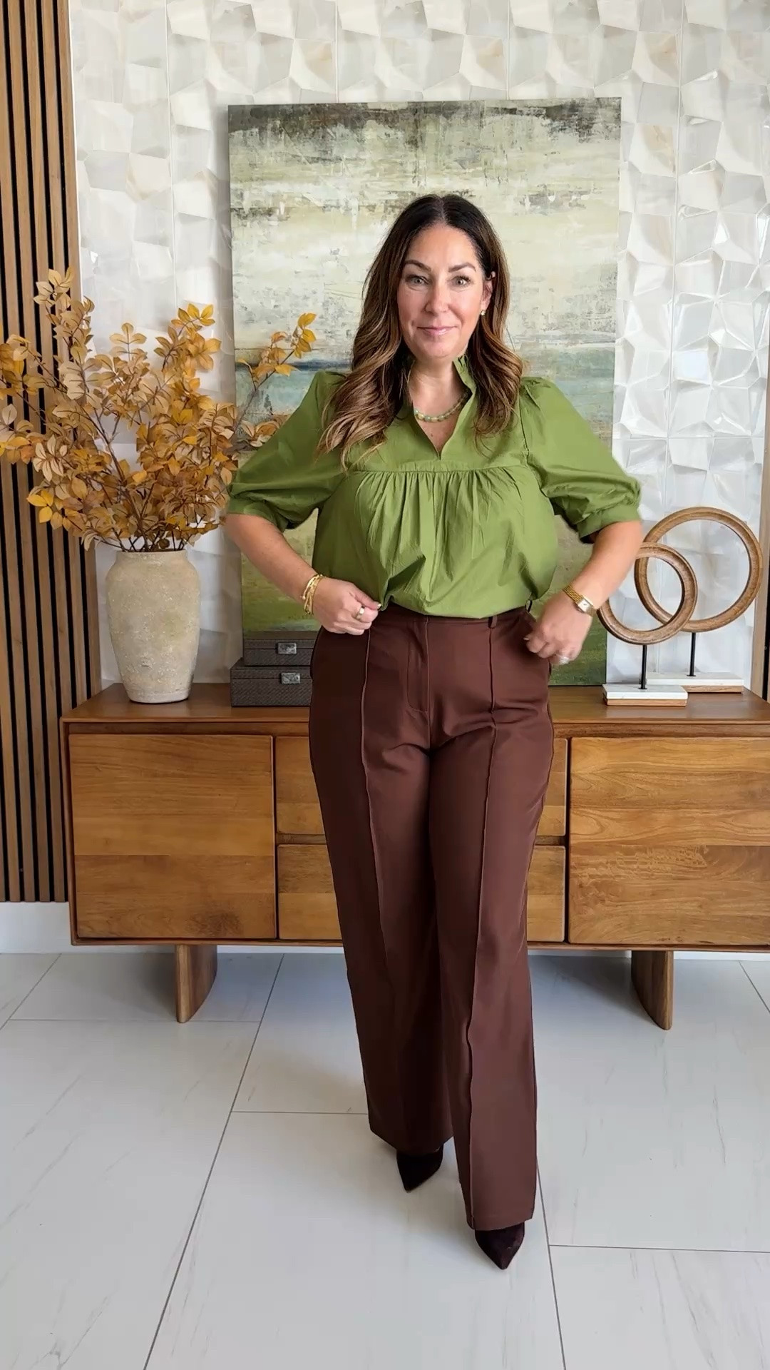 Fall workwear outfit idea 🫒 Olive green puff-sleeve blouse tucked into rich brown wide-leg trousers, styled with a brown bag, a silk scarf, and brown suede pumps. The green + brown color combo is a chic teacher outfit and business casual look.

Sizing: Top tts, L | Pants size up, XL

#LTKOver40 #LTKMidsize #LTKWorkwear