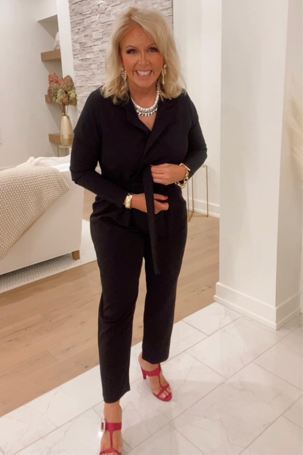 Holiday party outfit Inspo! You can’t go wrong with a black jumpsuit! Add some sparkly accessories and bright pink shoes! 

#LTKHoliday #LTKSeasonal