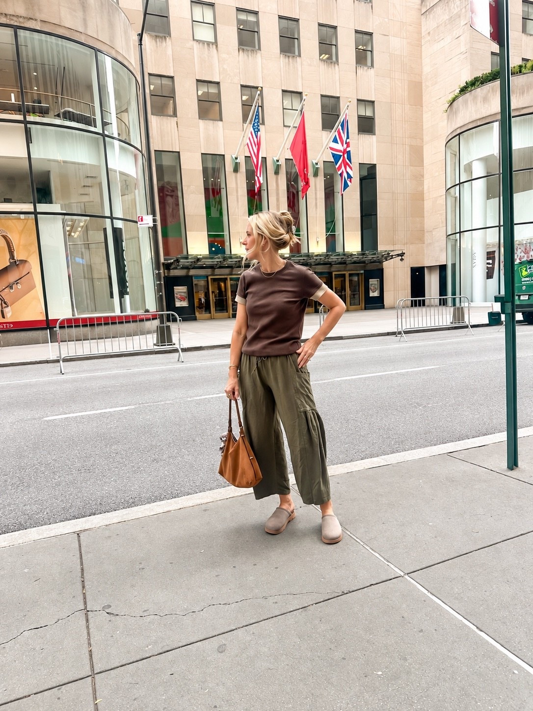 Fall NYC comfy mom outfit 🍂🗽 This was the perfect outfit for walking around the city! The tee + pants are both so comfortable, and these clogs might be the real MVP — I’ve walked all over New York City in them and my feet have been so comfortable. Wearing a medium in both the tee + pants!

#LTKNYFW #LTKdayinmylife #LTKmomlife