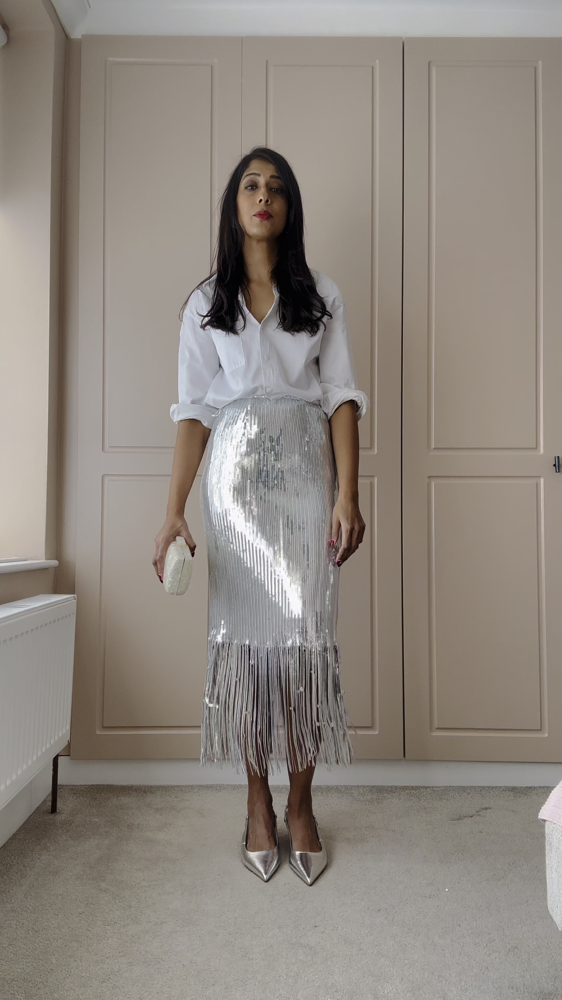 Well there had to be a try on! Love this sequin skirt with fringe detail @marksandspencerstyle Autograph. Think it works well with a white shirt, silver heels/jewellery and it’s not party for me if there’s no red lipstick. Love @maccosmeticsuki #rubywoo 

The skirt is loose on me and I would size down. The best thing about this outfit?!…no Spanx/shapewear and I get to wear a normal bra. I’m too old for uncomfortable stick on bras/tape situations. I have recently found the comfiest strapless bra that actually matches my skin tone! Will share soon. And yes it’s from M&S! 

The only way I can properly enjoy a night out out…I have to be comfortable! Anyone else the same?

Links on my @ltk.europe 

@marksandspencerstyle 
@marksandspencer 

#over40style #over40fashion #mymarks #over30style #mumstyle #partytime #partyoutfit #eveningoutfit #eveninglook #christmasparty #christmasoutfits

#LTKwinter #LTKautumn #LTKmodest