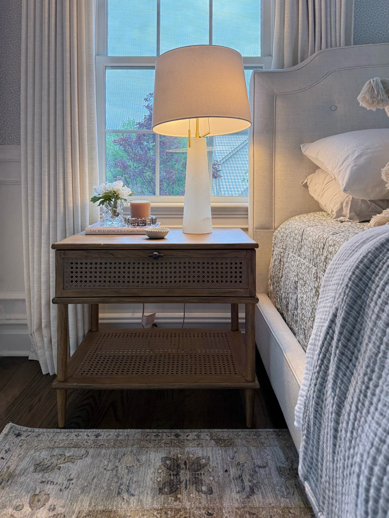 The mix of warm wood, woven cane, and soft linen makes this bedside setup feel so inviting. Love how the nightstand adds texture while still giving you plenty of practical storage.

cane nightstand, wood nightstand, bedroom decor, bedside table, neutral bedroom, woven furniture, bedroom furniture, cozy bedroom, home decor, girlonthehudson

#LTKSeasonal #LTKHome #LTKmorningroutine