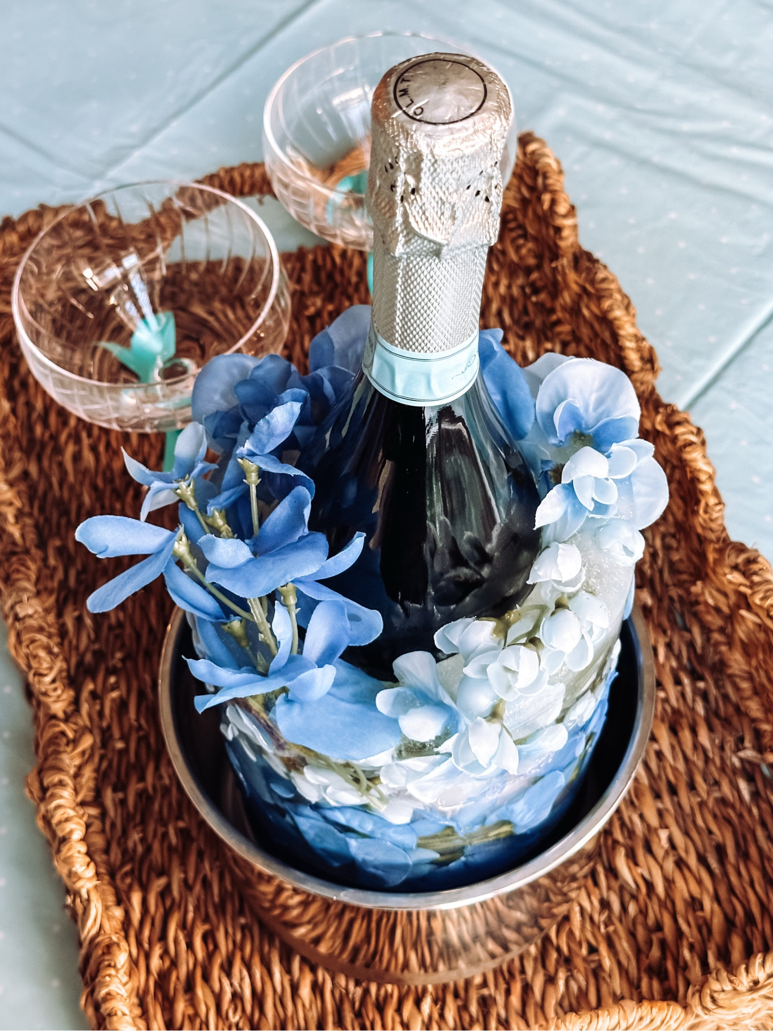 LOVE my DIY wine chiller!!! I have so much fun getting creative! I used blue wisteria for this one. These are fake stems from Michael’s! 🐰💙

#LTKWatchNow #LTKHome