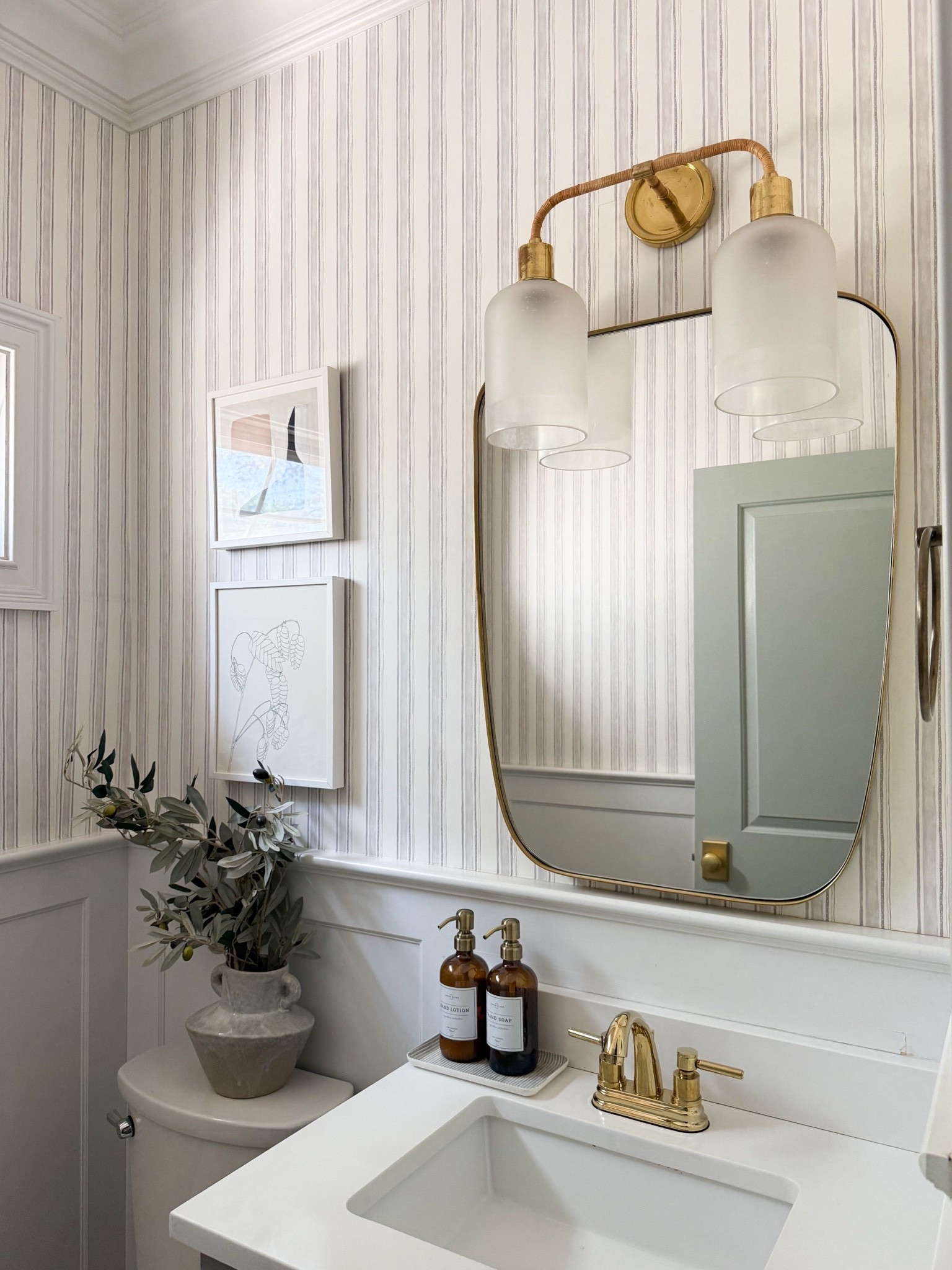 A little powder room update: lighting, a cool mirror and some art can really go a long way! And thag little pop of color from the door when it’s open 🩶

Bathroom, bathroom inspo, bathroom decor, brass hardware, wallpaper, wallpaper inspo, Serena & Lily, GIRLONTHEHUDSON, neutral home, modern coastal, minted art, cozy home, modern traditional, before and after

#LTKHome #LTKSeasonal #LTKdayinmylife
