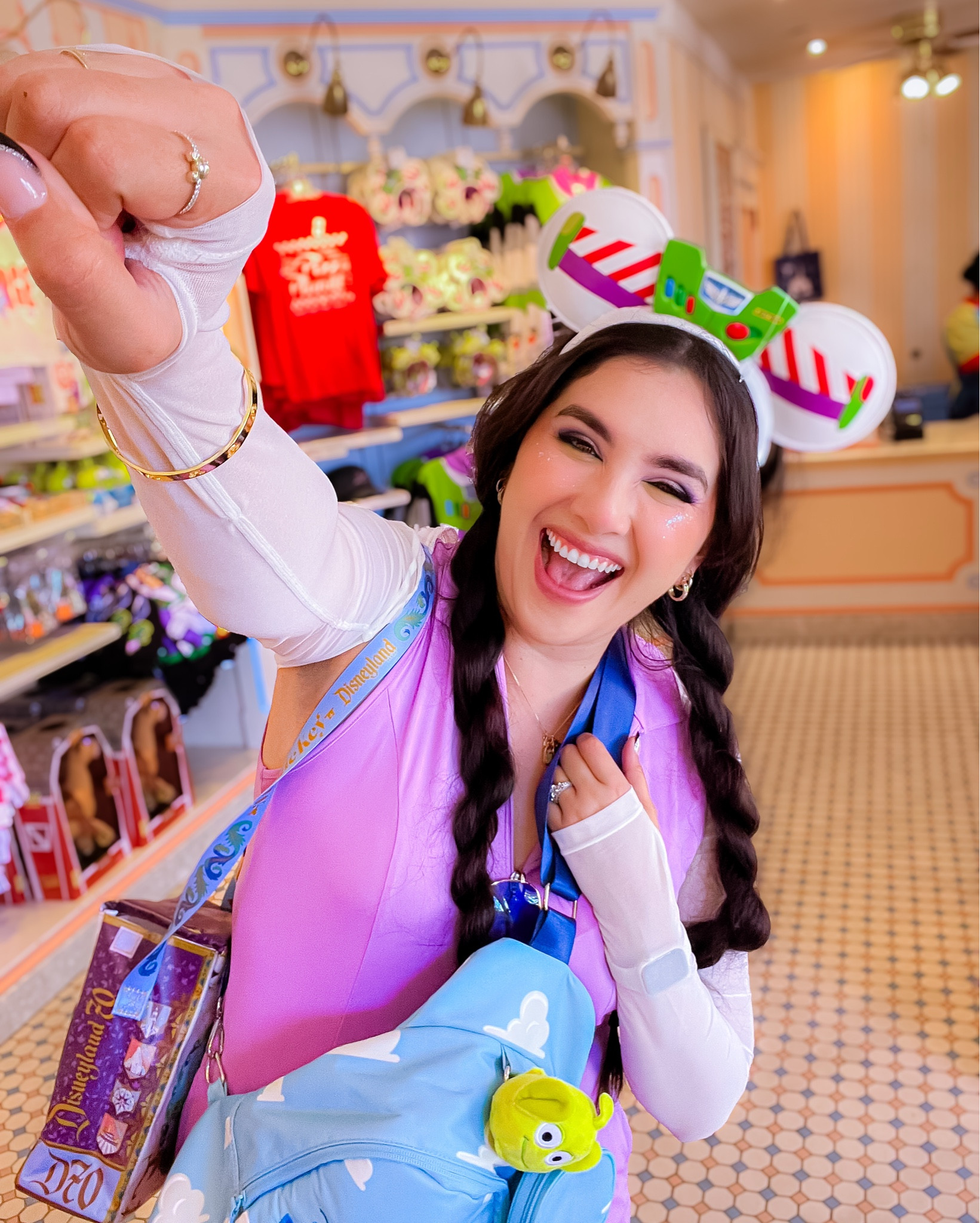🧑🏼‍🚀To Infinity & Beyond 🚀💜💚🤍 Had to do a casual Buzz lightyear Pixar bound for my recent trip over in Disney California Adventure Park! 

✨ If you haven’t gone on Toy Story Midway Mania it’s gotten a makeover to celebrate Disney’s 70th 🤗🎉 This is one of my favorite attractions 🎯

Don’t miss out on all the fun! Have yourself a Pixar Day and dress up in a Disney bound—you won’t regret it😄 

🐭 This outfit is also perfect for summer, light, breezy, colorful and comfortable 🥰 I linked some Disney ears, a Pixar loungefly backpack and a few other Pixar accessories you might like 🫶🏼

If you’re still shopping around lmk what you need help looking for in the comments ✨

disneyland 70 outfit, pixar, buzz lightyear, Pixar bound, Disney bound, Pixar style, Disney parks, Angie’s magical style, buzz lightyear Disney bound, Toy Story, Jessie, Pixar outfit, Pixar ootd, Disney headband, colourpop makeup 

#LTKGiftGuide #LTKSummerEdit #LTKBeauty