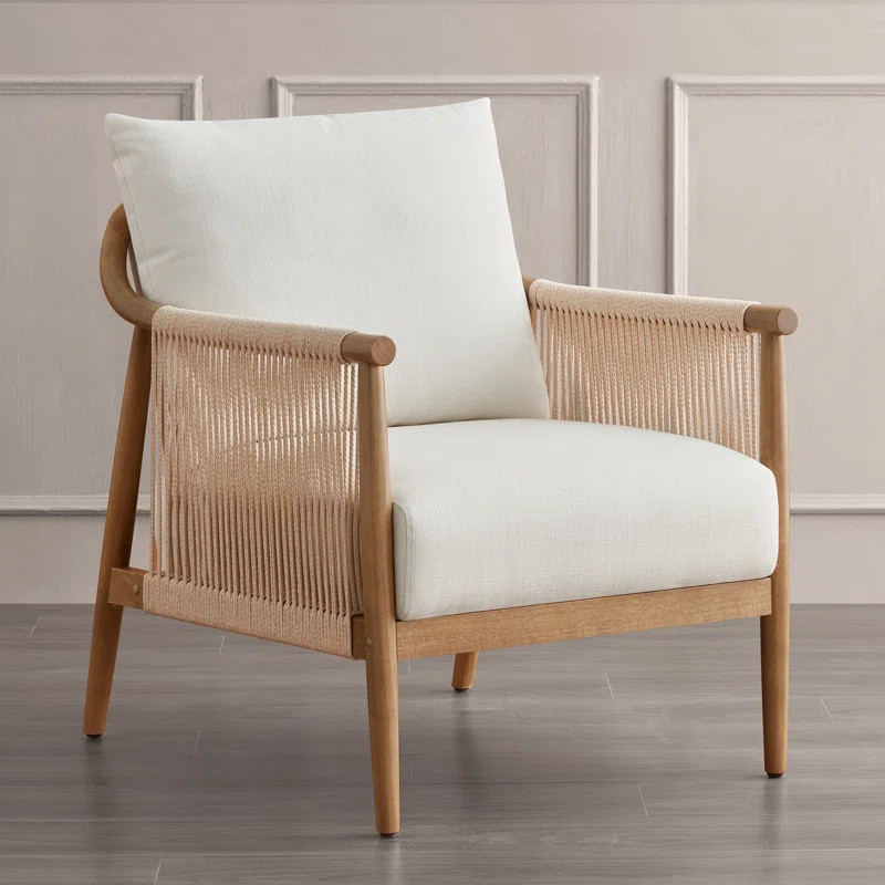 This armchair pairs a mixed-material design with a relaxed silhouette to bring an airy feel to yo... | Wayfair North America