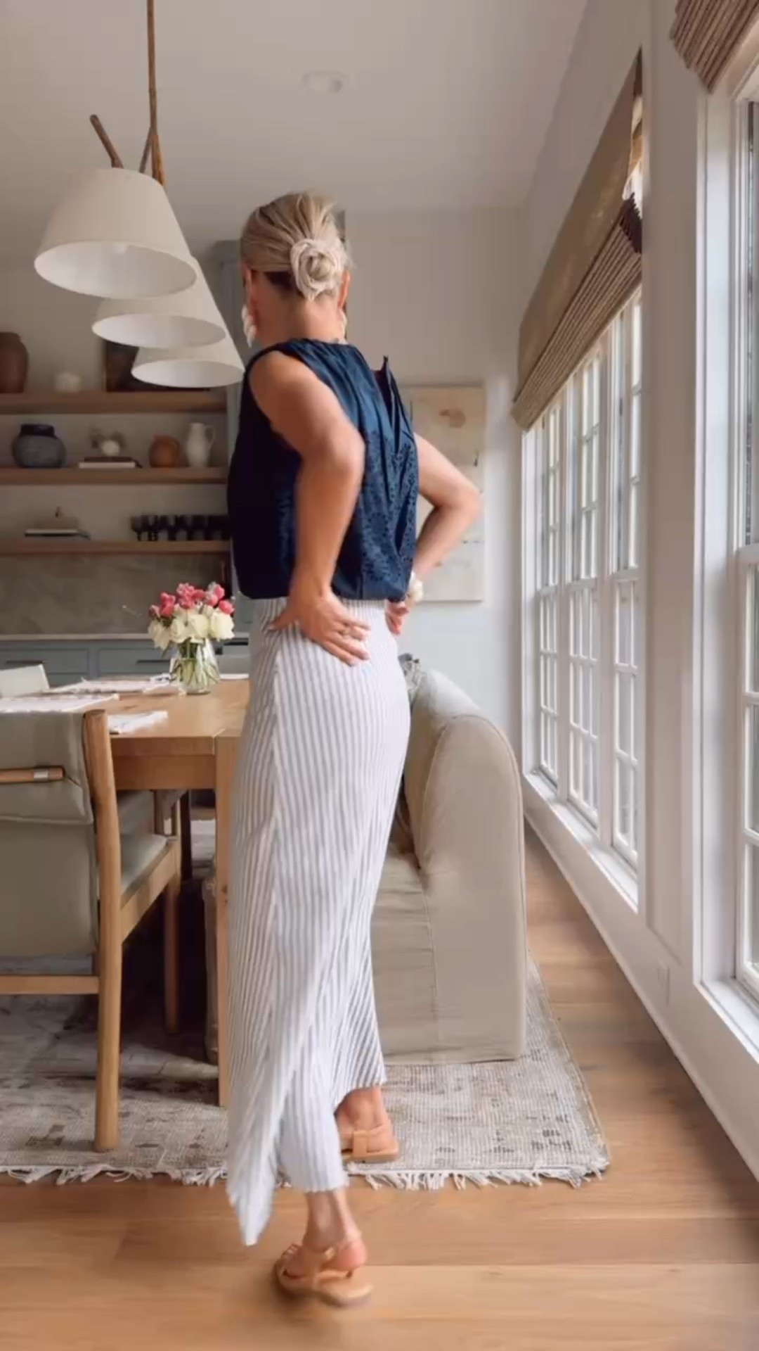 This is such an easy, elevated outfit for summer! You could dress this up or down for many different occasions! Wearing XS. 

Loverly Grey, Loft, summer fashion, summer outfit ideas, vacation outfit ideas, striped maxi skirt, blue tank top

#LTKStyleTip #LTKFindsUnder100 #LTKSeasonal