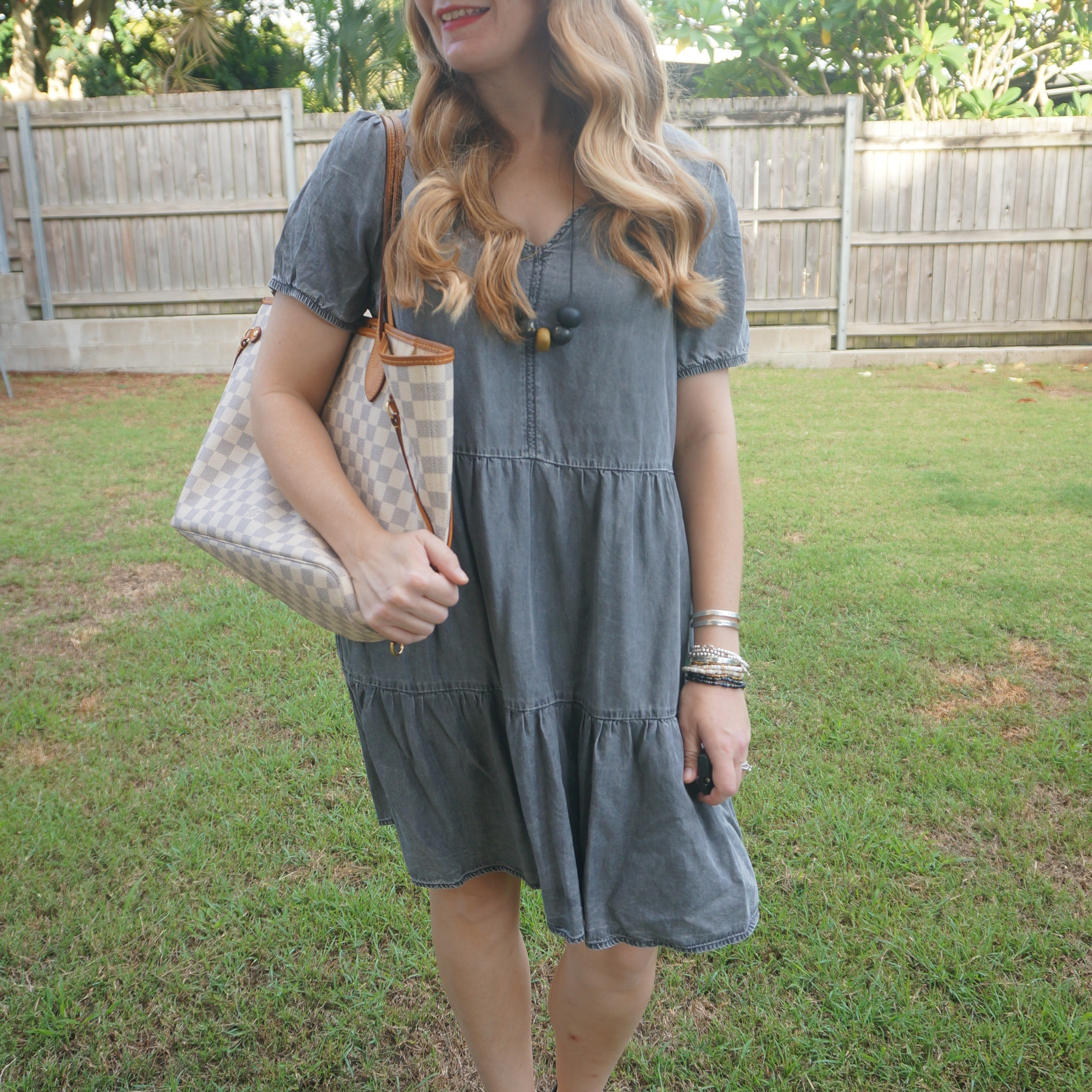 Thrifted tiered denim dress with Louis Vuitton damier azur neverfull tote bag 🖤

#LTKbag #LTKautumn #LTKdresses