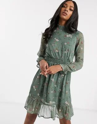 Vero Moda shift dress with high neck and ruffle hem in green floral | ASOS US