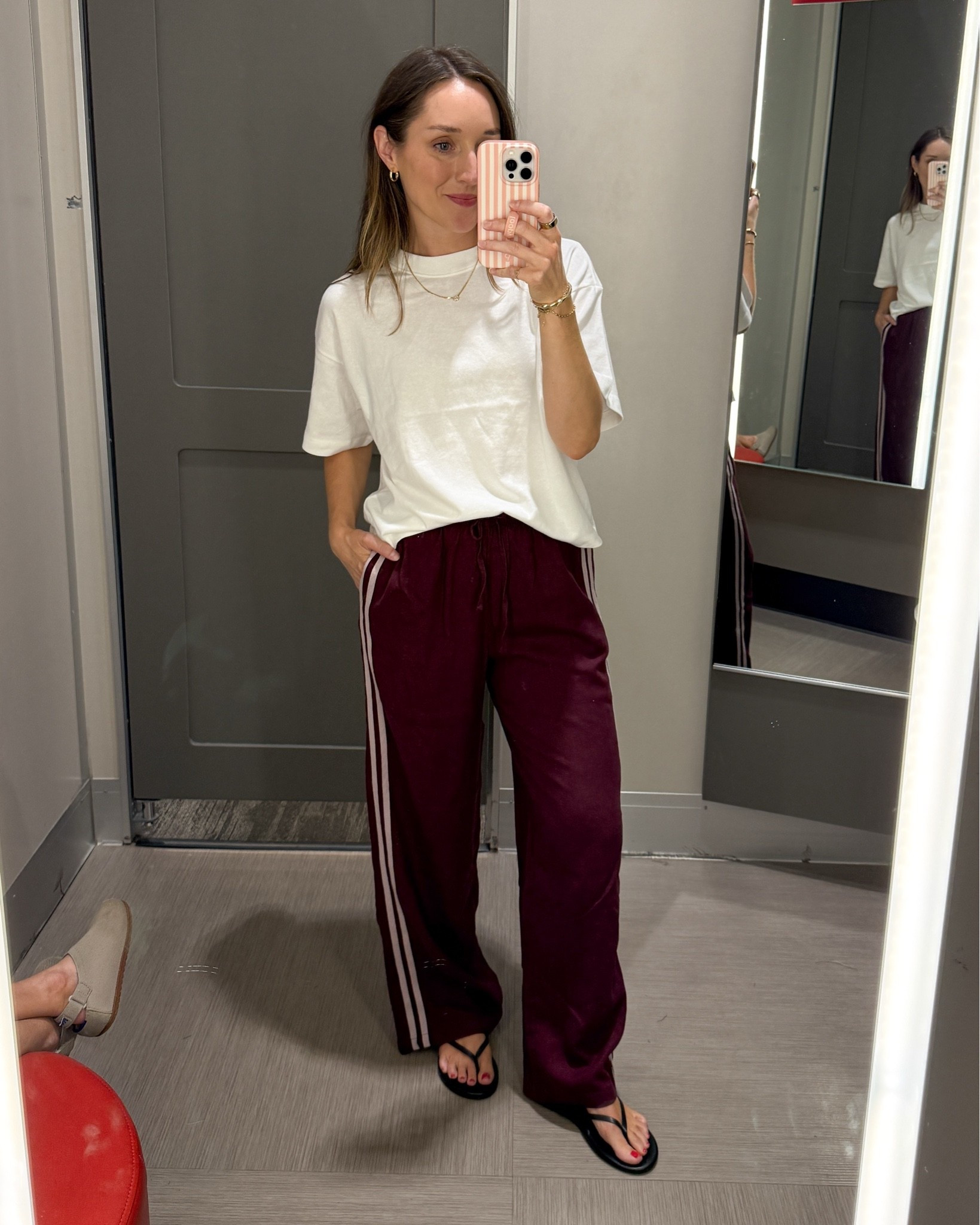 If you live in hot weather, but you’re looking for a fall looking pant, these are it. These are a linen fabric, but with a track pant look. They would be great for places where it is hot well into October and you want a fall vibe. Wearing an XS. ￼