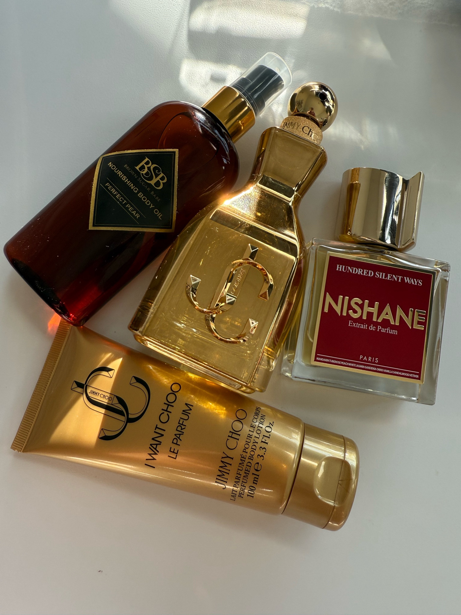 💛I SMELL GOOD💛

✨JIMMY CHOO I WANT CHOO LE PARFUM✨
Top - pear, golden gardenia, blackberry
Middle - jasmine absolute, patchouli, ambrette
Base - sandalwood, moss, praline

✨Nishane Hundred Silent Ways 
Top notes: tuberose, peach, and mandarin orange 
Heart notes: gardenia, jasmine, and orris 
Base notes: vanilla, sandalwood, and vetiver

✨Brown Sugar Babe Perfect Pear
Top: Baked Pear, Apple, Almond
Middle: Rum, Ylang Ylang, Coffee
Heart: Sugar Cane, Caramel, Whipped Cream, Cinnamon




#LTKGiftGuide #LTKOver40 #LTKBeauty