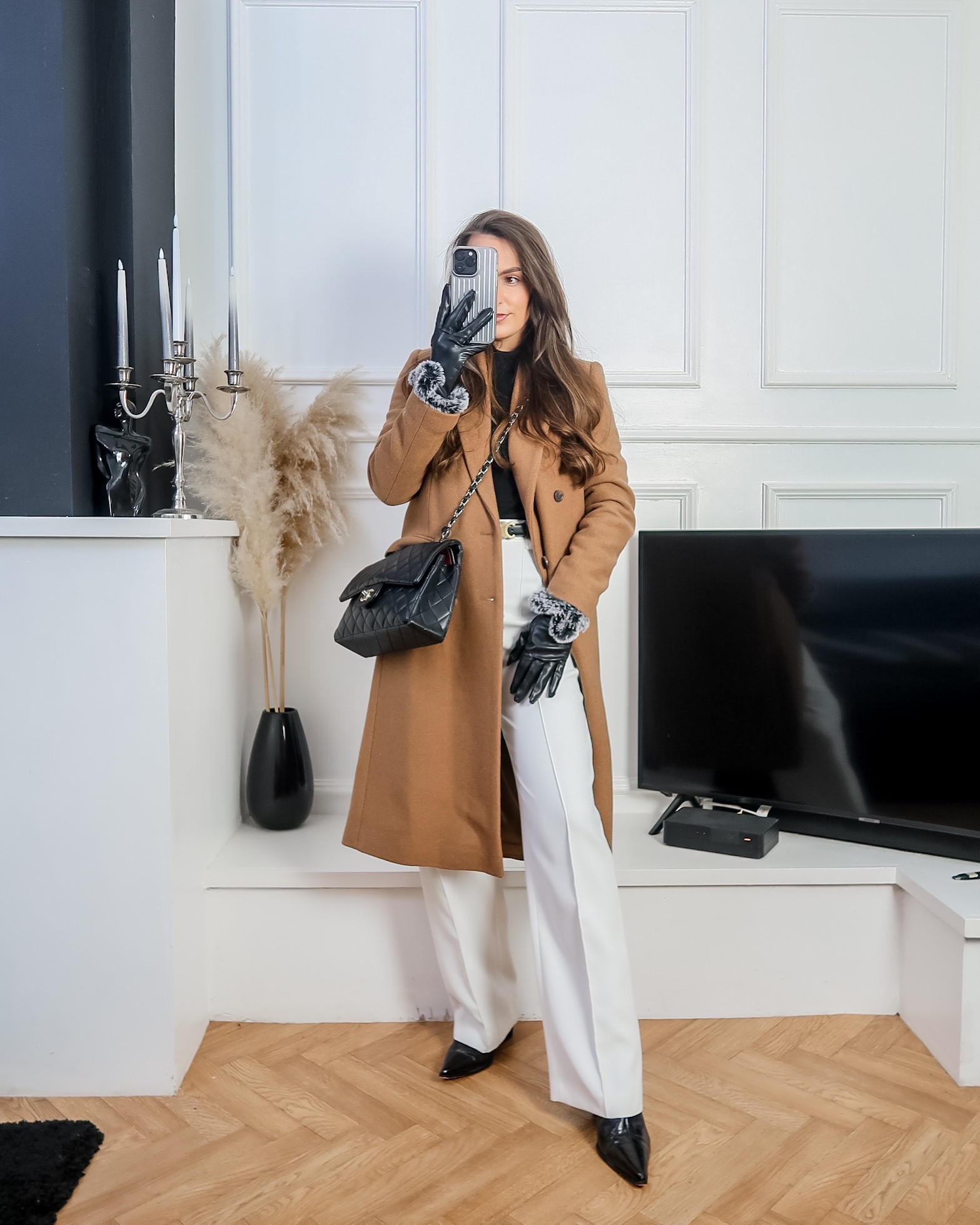 Chic office style, Midweek workwear, Business casual inspiration, Tailored winter outfit, Camel coat styling, White trousers outfit ideas, Classic black and white look, Timeless office fashion, Luxury accessories inspiration, Winter Whites, white tailored trousers, camel wool coat, black turtleneck, black pointed ankle boots, leather gloves 

#LTKuk #LTKworkwear #LTKwinter