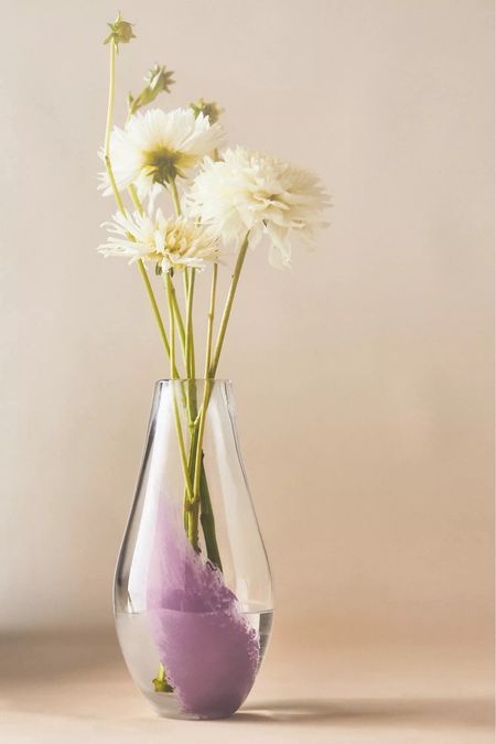 Discover the perfect blend of beauty and functionality with thisstunning new vase. Featuring a soothing swirl of colors and a smooth, sophisticated silhouette, this vase is designed to elevate any bouquet. Whether you're displaying fresh flowers, dried arrangements, or simply enjoying it as a standalone piece, it adds a touch of elegance to any room. 

Transform your space with a vase that’s as versatile as it is beautiful. Perfect for gifting or enhancing your own decor. Experience the art of living beautifully with our swirl vase. 

#HomeDecor #ElegantLiving #FloralArt #InteriorDesign #VaseLove

#LTKSummerSales #LTKSaleAlert #LTKHome