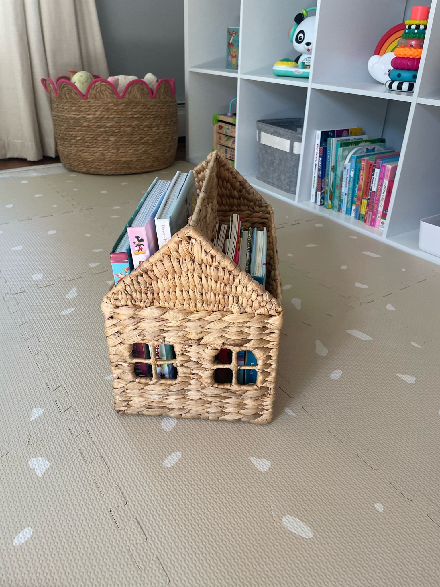Braided hyacinth house shaped book organizer 

#LTKFamily #LTKBaby #LTKKids