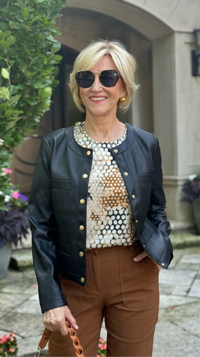 Polish meets casual ✨ This leather jacket with gold buttons, paired with a printed tee and camel cropped pants, is the perfect look to transition into Fall. Effortless, chic, and ready for crisp autumn days!


#LTKStyleTip #LTKOver40 #LTKSeasonal