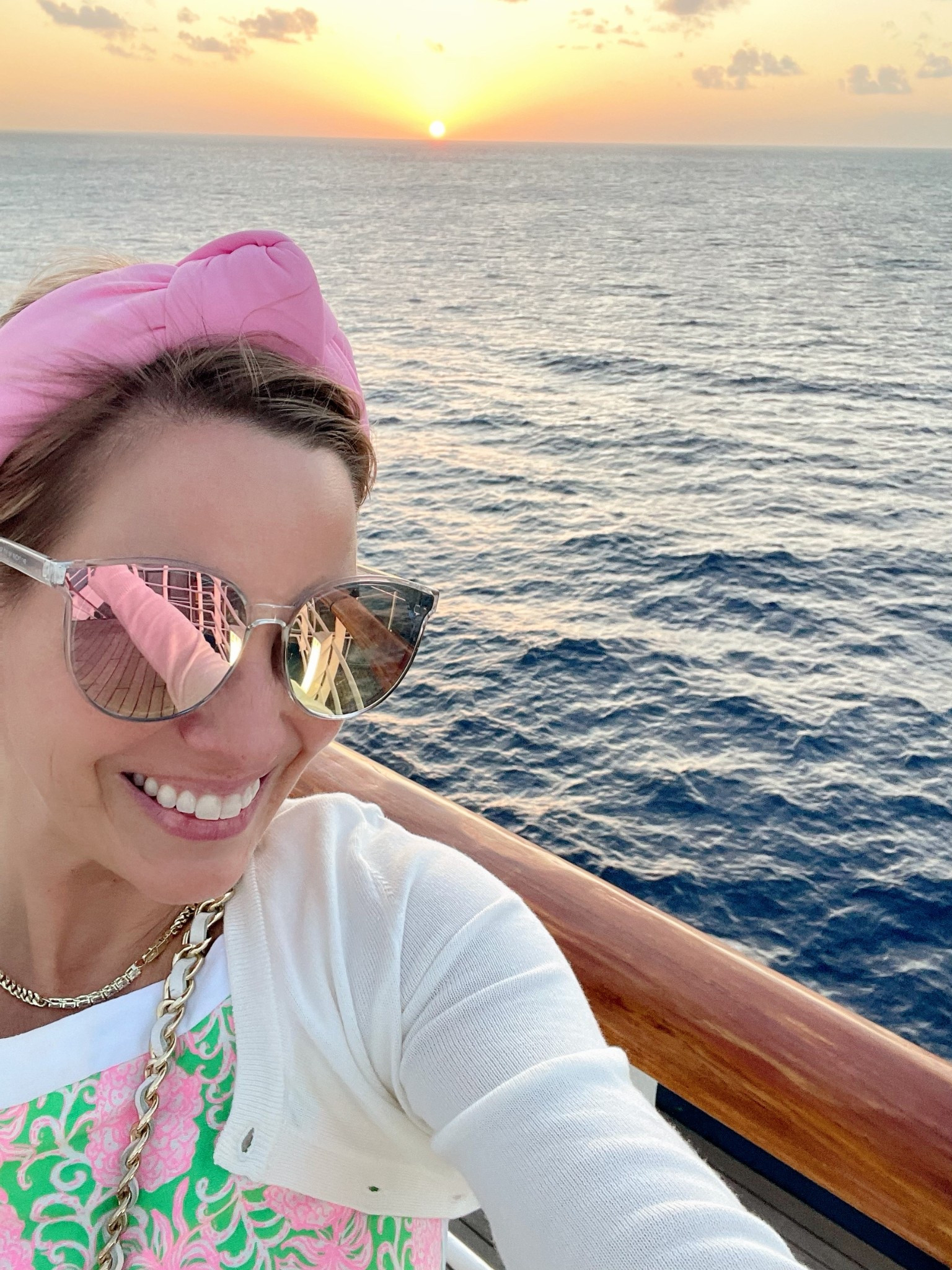 Code ASHLEYBA for 10% off my Melinda Maria jewelry 💫✨

Golden hour on the open sea 🌅🚢! Snapped this dreamy sunset selfie on the cruise deck in my Lilly Pulitzer dress featuring classic pink and green florals — the ultimate tropical print for vacation nights 🌸🌿. I layered on a white cropped cardigan for a breezy evening look and added bold gold chain accessories for that luxe touch 🤍🌊⛓️.

Topped it all off with a pink knotted headband and mirrored sunnies — because vacay style is all about the little details 🕶️🩷

Outfit Details:
	•	Dress: Lilly Pulitzer (signature pink & green print) 🌺
	•	Cardigan: white button-front layer ☁️
	•	Accessories: gold chain necklace, mirrored sunglasses, Melinda Maria jewelry (code ASHLEYBA for 10% off!) 💎🛍️
	•	Headband: pink knotted turban-style 🎀


Lilly Pulitzer cruise outfit, sunset selfie cruise look, tropical resort fashion, pink and green dress, vacation outfit ideas, evening cruise style, preppy travel outfit

Perfect for:
Sunset at sea 🌅, cruise date night 🌊, spring break style 💕, tropical getaway looks ✈️, golden hour photos 📸

Sunset skies + Lilly vibes = a perfect night on deck! Everything is linked on LTK! 🛍️🌴🌞

#LTKFindsUnder50 #LTKFindsUnder100 #LTKOver40