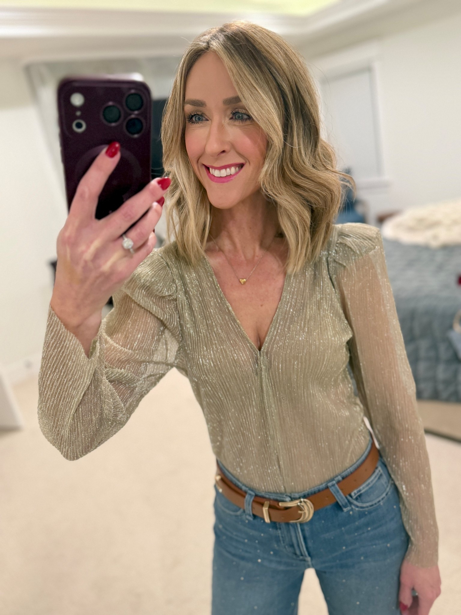 Holiday outfit! Shimmer bodysuit and rhinestone wide leg denim 

#LTKOver40 #LTKHoliday #LTKFindsUnder50