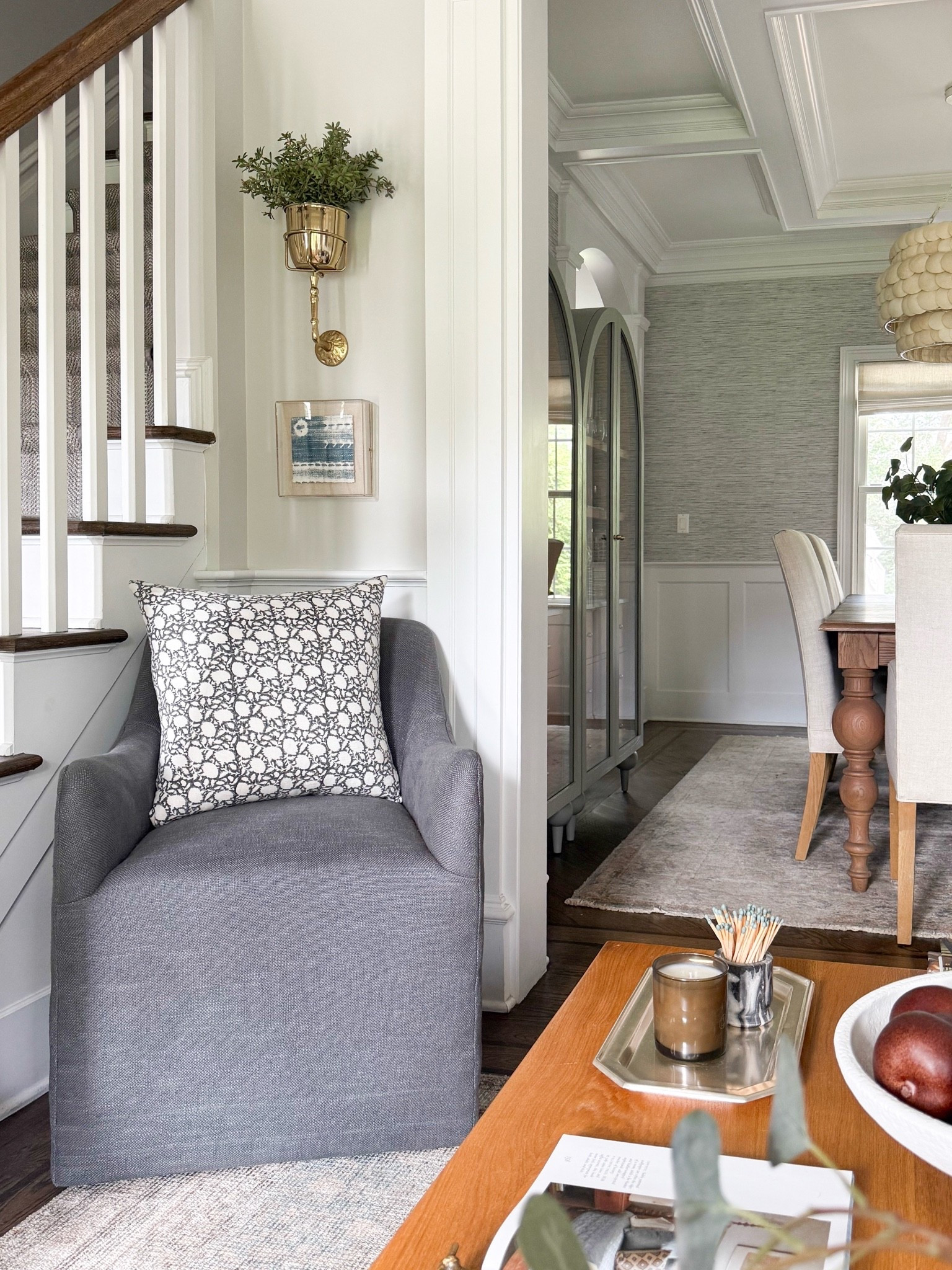 A quiet little corner that proves every space can have a purpose. The gray accent chair, patterned pillow, brass wall planter, and collected details make this spot feel intentional without needing much room.

accent chair, living room chair, small space decor, traditional home decor, gray accent chair, patterned pillow, brass home decor, living room styling, collected home, girlonthehudson

#LTKSeasonal #LTKHome #LTKdayinmylife