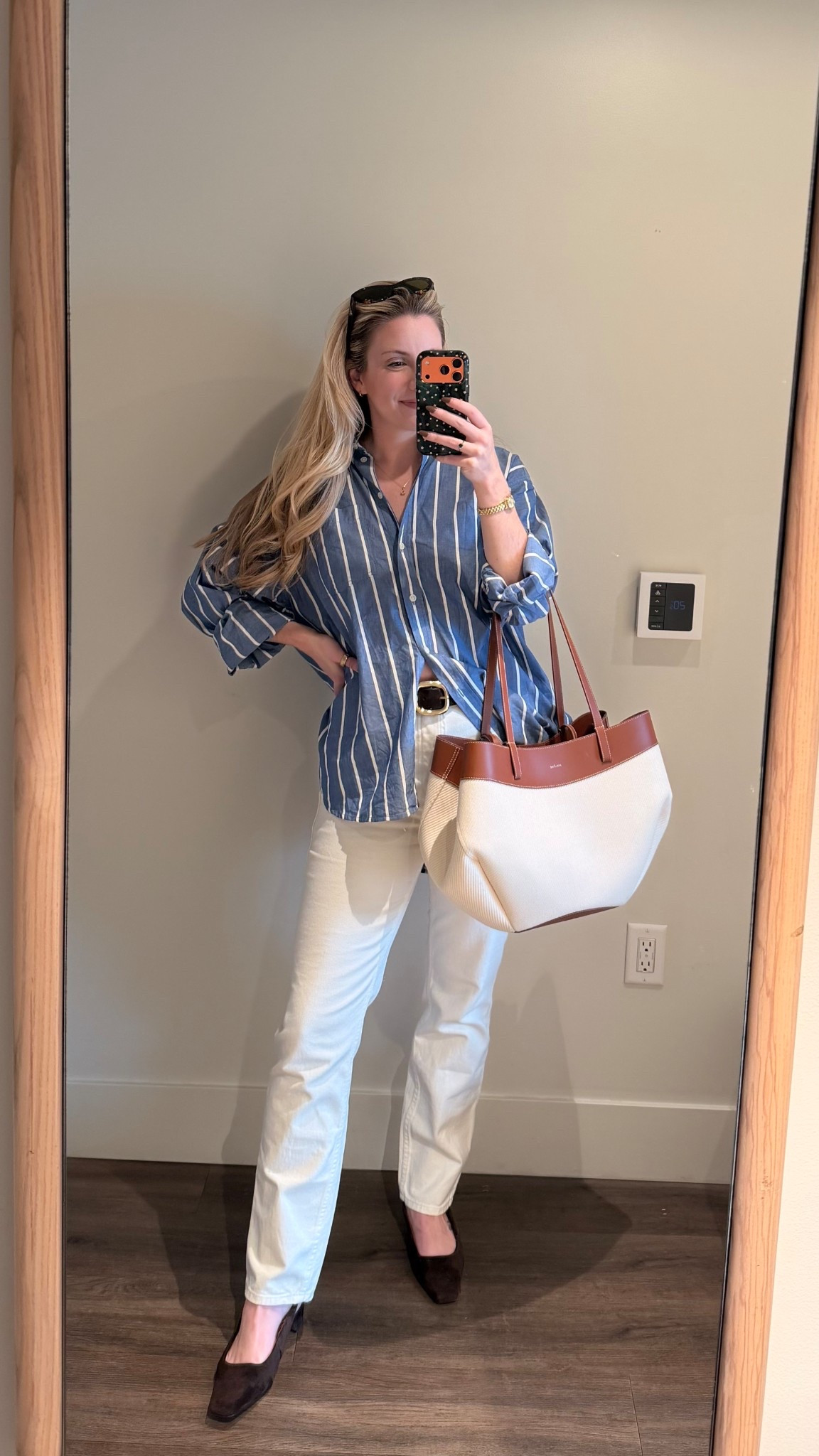 One of my favorite easy outfit formulas lately: great denim + an oversized striped button up.

This look feels effortless but still polished, which is exactly what I want for everyday outfits. The Sézane Brut jeans have such a flattering straight leg fit, and I love pairing them with a relaxed striped shirt and classic accessories.

Wearing:
• Sézane Sexy Brut jeans
• J.Crew oversized striped button up
• Franco Sarto slingbacks
• Polène bag

Everything is linked here if you want to recreate the look ✨

#LTKspringtrends #LTKspring #LTKSpringSale