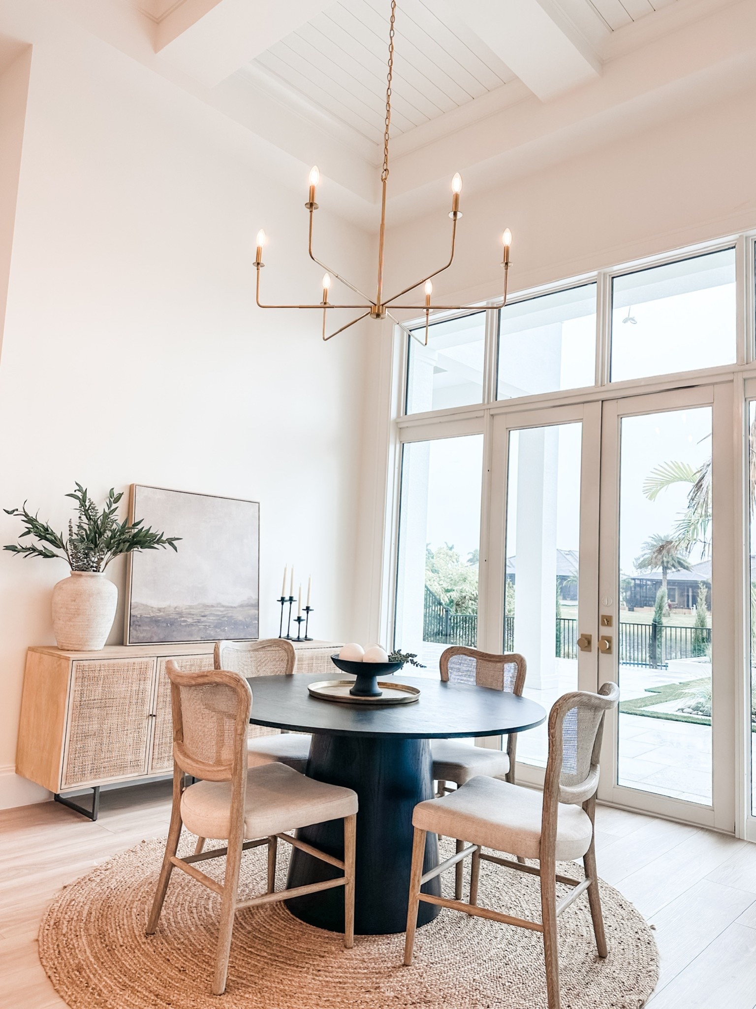 Timeless, neutral, and effortlessly chic ✨ Shop my dining room and bring home this warm, inviting look! From the black pedestal table to the woven textures, brass chandelier, and natural elements, every detail creates a cozy yet modern space. 🏡🌿 Find all the pieces linked!

#LTKFamily #LTKSaleAlert #LTKHome