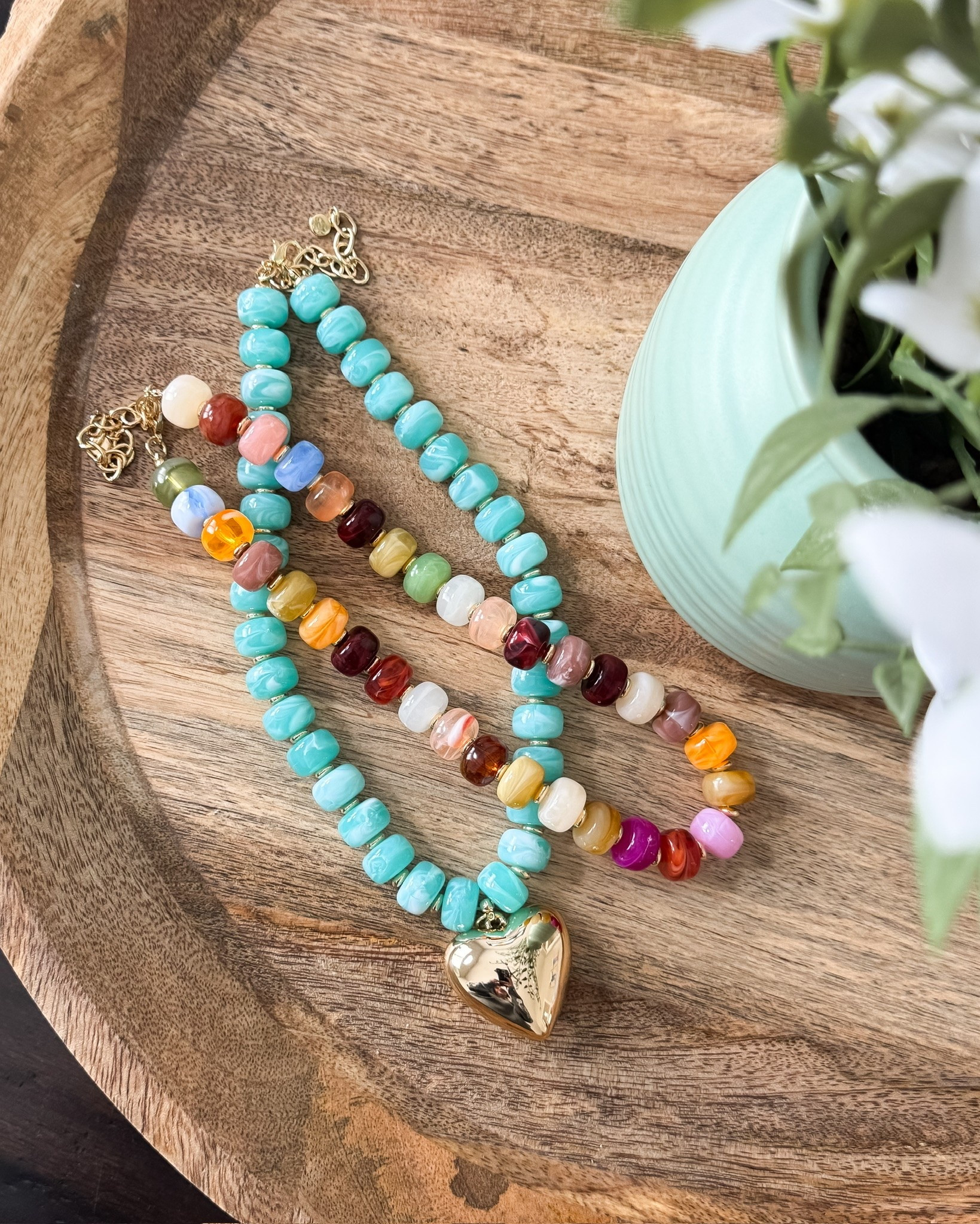 This beaded necklace adds the perfect pop of color to any summer outfit. I love how the turquoise and colorful beads make even a simple tee feel more styled and fun.

colorful necklace, beaded necklace, statement jewelry, summer accessories, turquoise necklace, colorful fashion, vacation style, beachy accessories, layered jewelry, boutique accessories, everyday style, summer trends, lovelylifestyling

#LTKSeasonal #LTKootd #LTKOver40