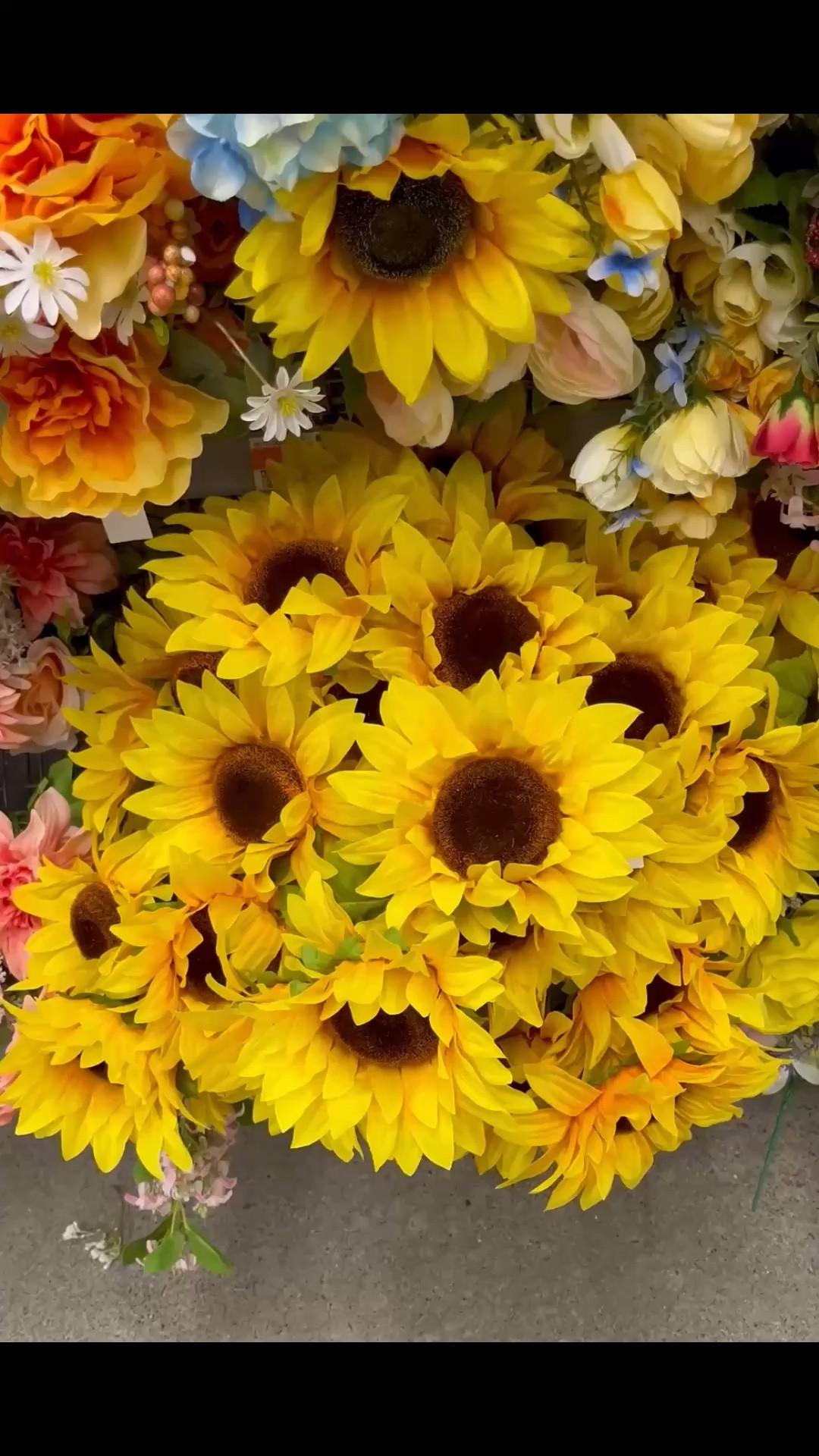 Pretty faux sunflowers at Walmart. An inexpensive addition to your late summer/ early fall wedding decor. 

#LTKHome #LTKWedding #LTKSeasonal