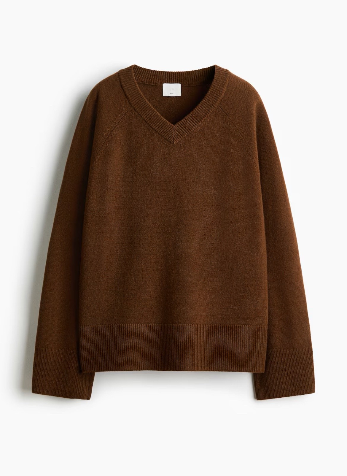 Brown wool v neck sweater 

#LTKFindsUnder100 #LTKSeasonal