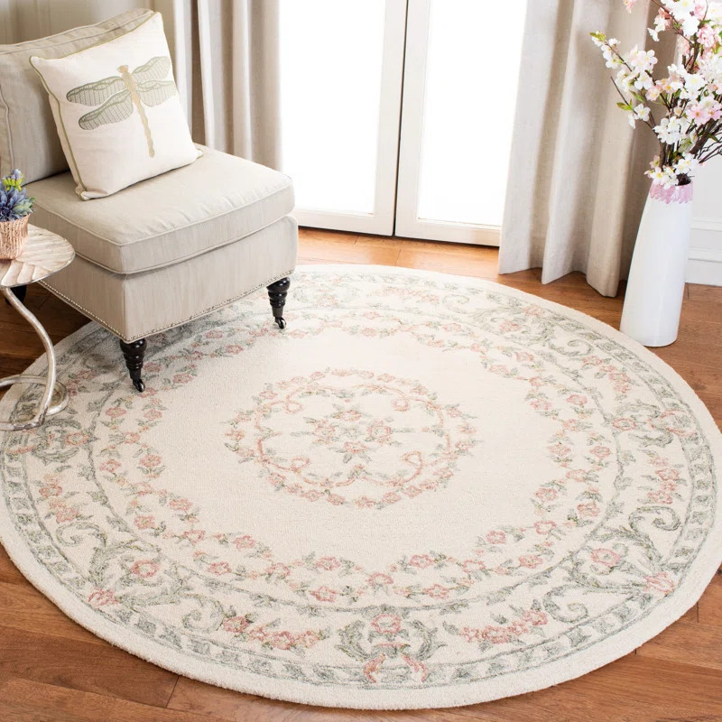Barnsdall Oriental Handmade Tufted Wool Area Rug in Ivory/Pink | Wayfair North America