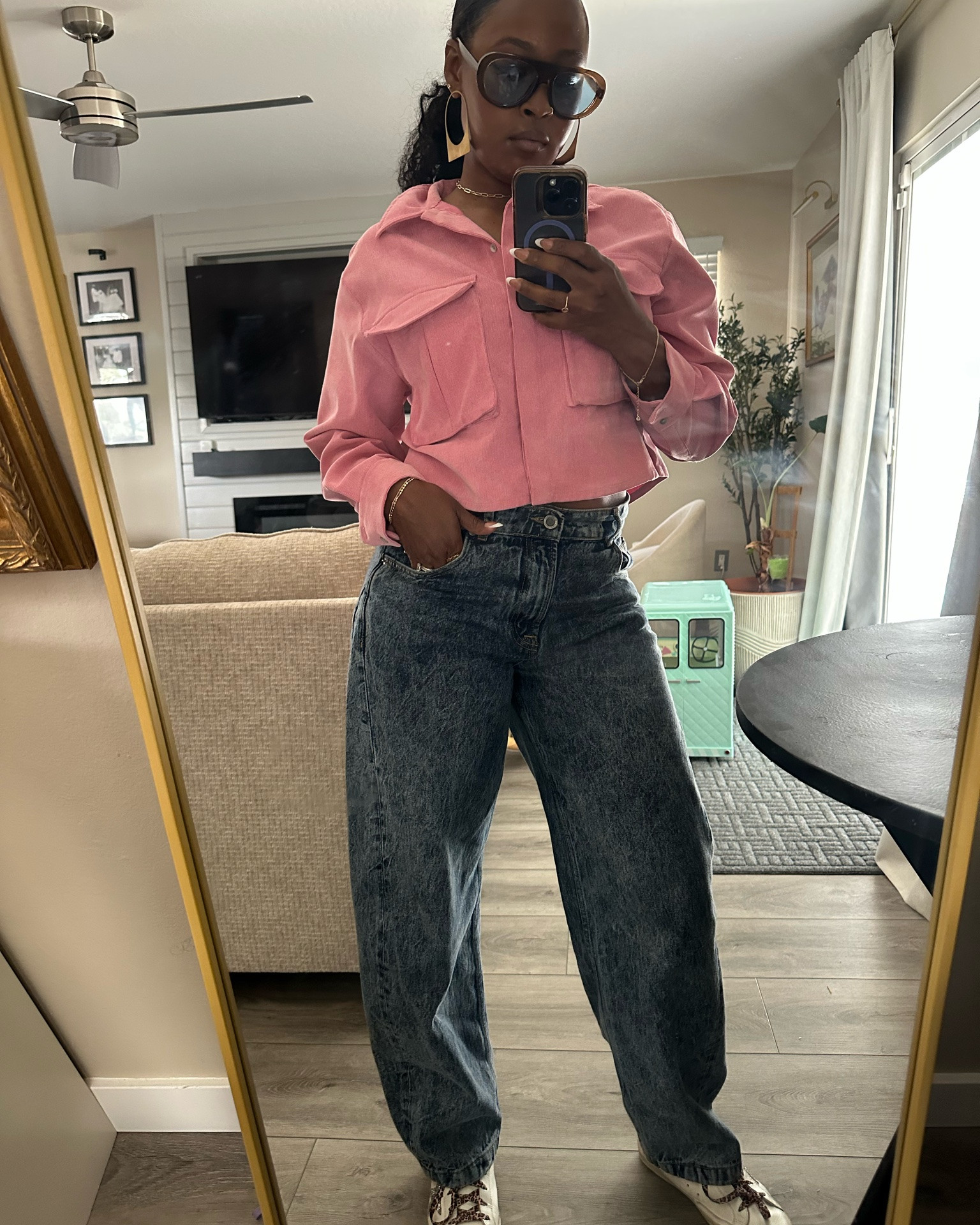 Casual Mom Outfit of the Day 💕

Styled this look with a cropped pink Zara button-up, relaxed barrel jeans, and Golden Goose sneakers with leopard laces for an effortless mix of casual, sporty, and elevated style.

The oversized fit of the barrel jeans paired with the structured cropped top gives this outfit that cool relaxed silhouette that’s trending right now while still feeling easy and wearable for everyday mom life.

Details I’m Loving:
• Pink Cropped Zara Button-Up  
• Barrel Jeans  
• Golden Goose Sneakers  
• Leopard Shoelaces  
• Oversized Sunglasses  
• Casual Everyday Style  

If you love effortless outfits, relaxed denim, elevated basics, cool-girl casual style, and Zara fashion… this look is SUCH a vibe ✨

Everything I’m wearing is from Zara except the sneakers, so I linked similar current styles and alternatives on my LTK.

#LTKStyle #BarrelJeans #CasualStyle

#LTKmomlife