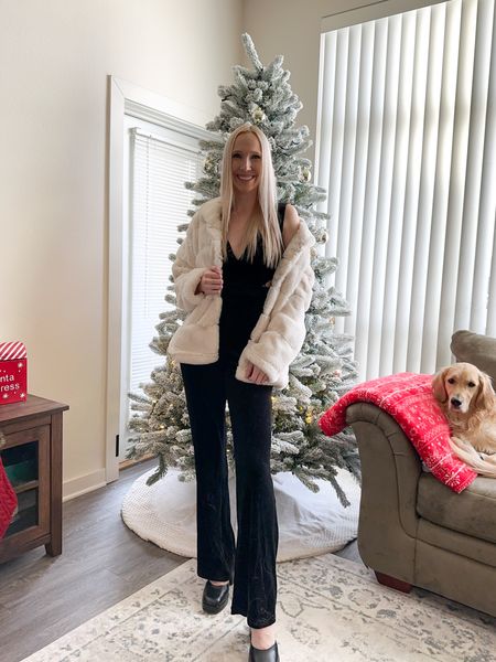 Holiday party outfit idea of NYE party look! ✨

Wearing a size XS in this black velvet jumpsuit and white faux fur coat ☺️

Black lace jumpsuit, holiday outfit, Christmas party outfit, winter wedding guest outfit, black jumpsuit, holiday party outfits, lulus outfits, winter coat, holiday event outfit

#LTKHoliday #LTKwedding #LTKSeasonal