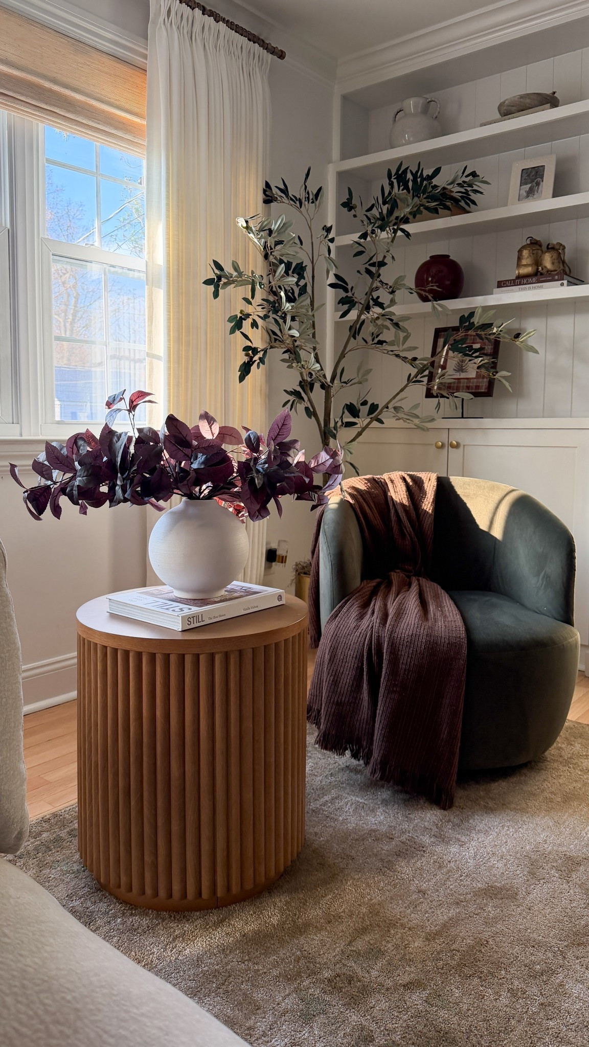 This little corner is hitting all the cozy notes lately 🤎
Soft textures, warm woods, and winter stems make it feel calm without being overly decorated. ✨


#LTKHome #LTKHoliday #LTKSaleAlert