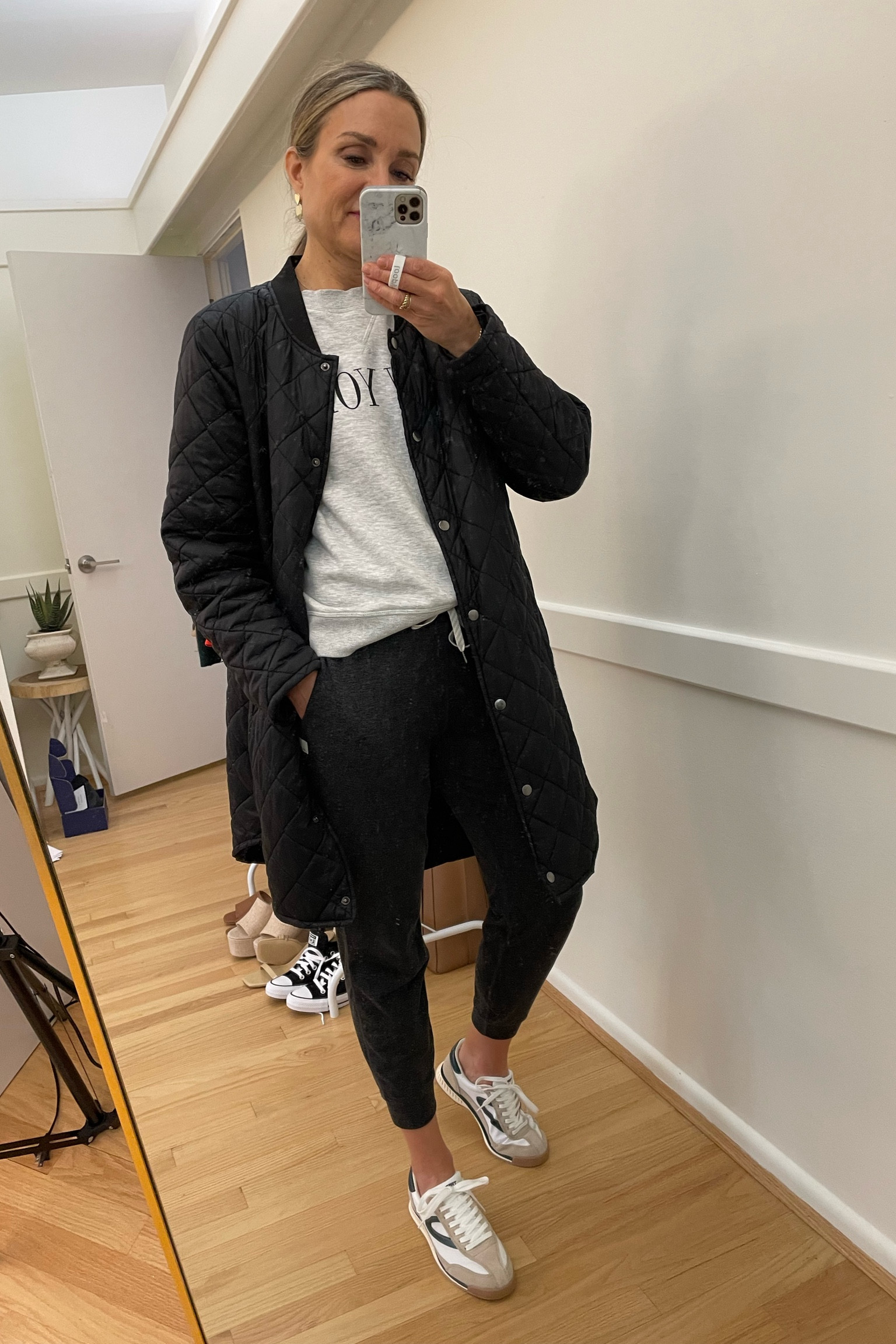 Spring casual ootd! New York sweatshirt, vuori joggers, tretorn sneakers, long quilted coat. Medium in joggers  #ltkspring

#LTKunder100 #LTKFind #LTKshoecrush