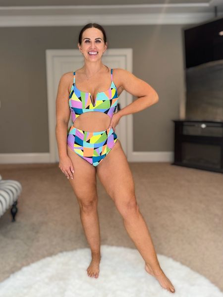 Not usually a one piece girl, but this one has changed my mind. The V-cut top has adjustable straps, a tie in the back and it is full coverage. The print is fun yet flattering. Wearing a size Large (11/13)  

#LTKswim #LTKtravel #LTKmidsize