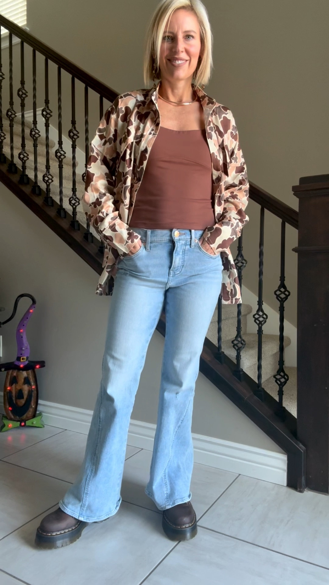 Amazon is killing it with the Prime Day deals 🙌 Loving this floral camo shirt + halter combo — both are such good finds!

#LTKSaleAlert