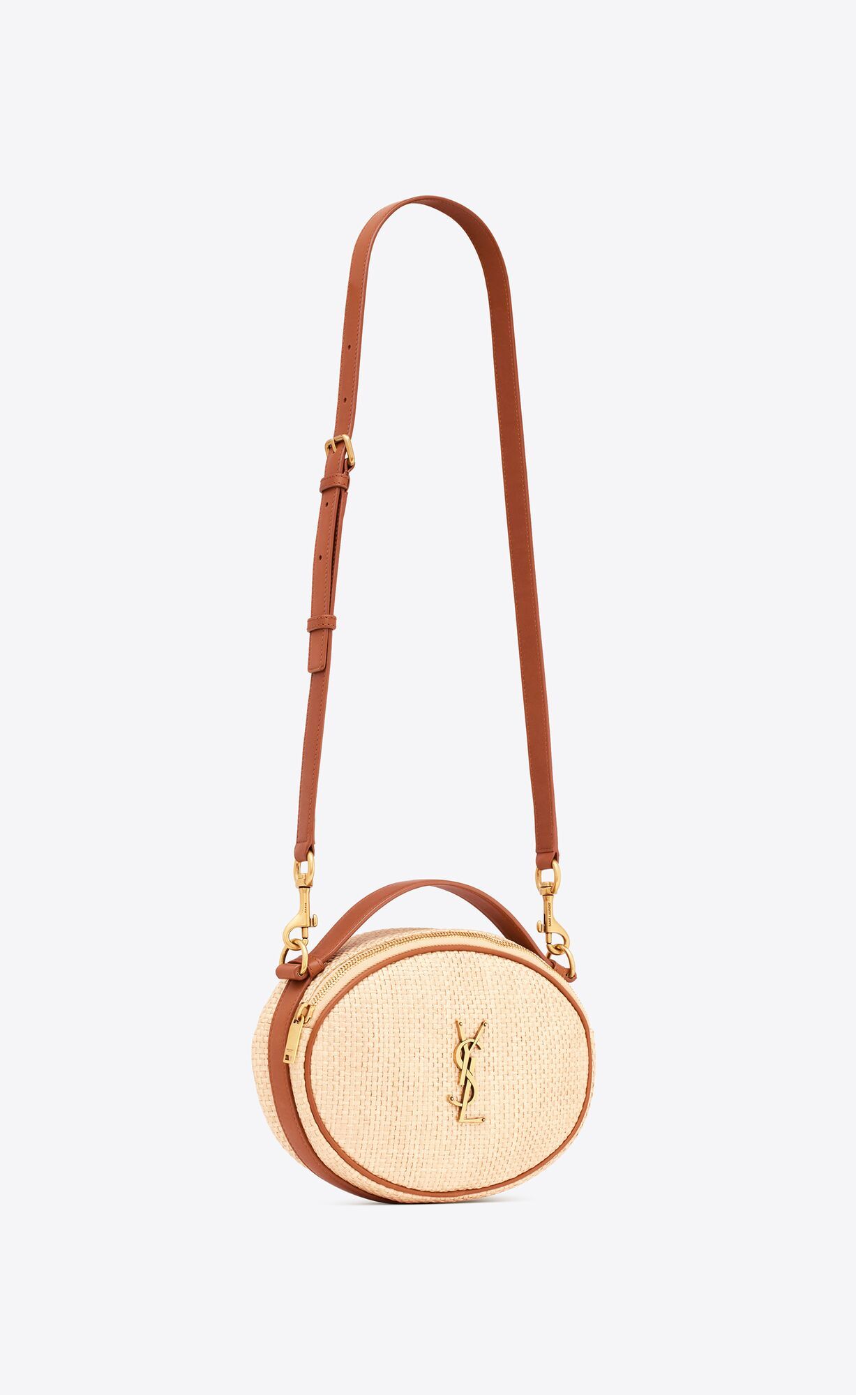 Round crossbody bag made with responsible viscose, decorated with the Cassandre, and featuring a ... | Saint Laurent Inc. (Global)