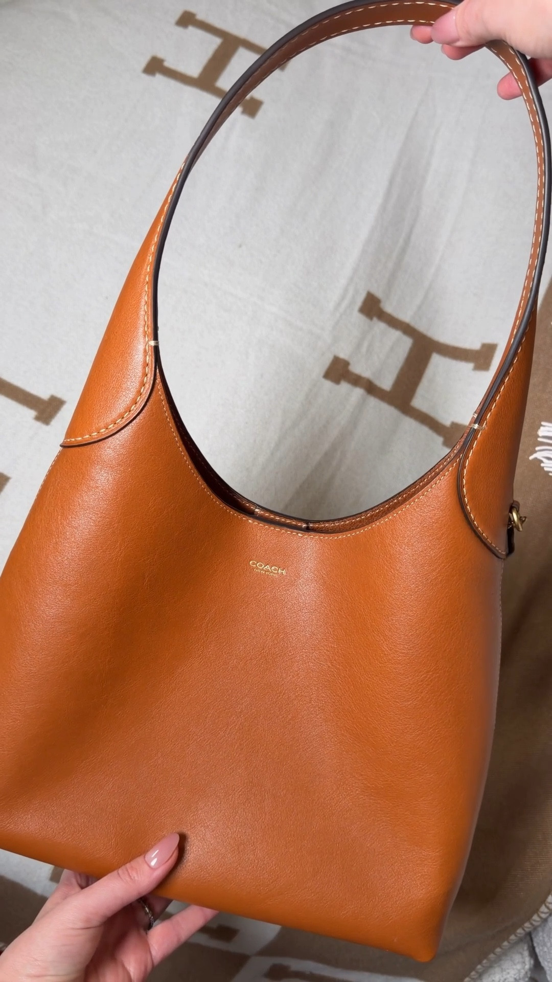 The bag so nice, I bought it twice 😍 had to grab the Coach Brooklyn 28 in this color. I have been thinking about it everyday since it came out 😅 Comment BAG & I’ll dm you the link! 🧡 

This is the Brooklyn 28 in the color toffee and it is such a stunning color! I kept talking about it all the time so my husband surprised me with it 😍

Coach bags
Coach purse
