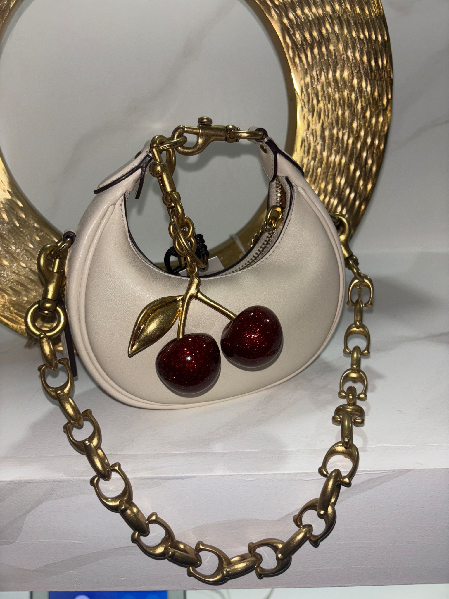 Coach cutie 🍒 

#LTKStyleTip