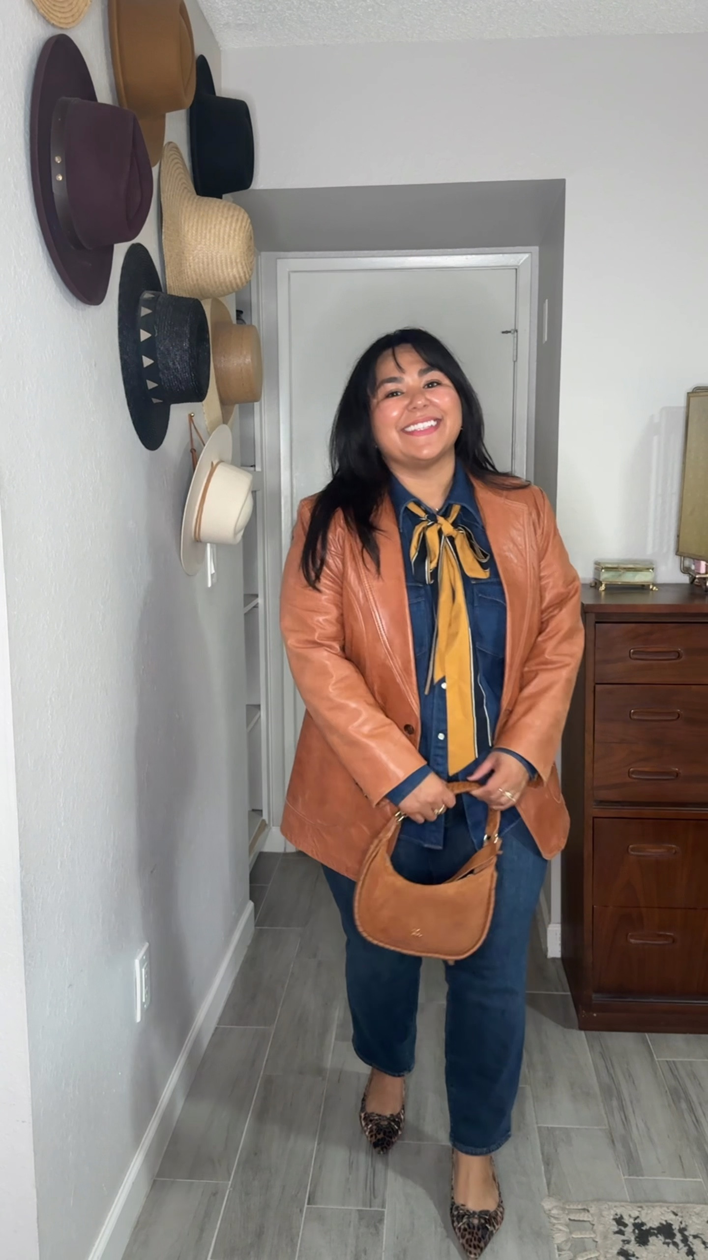 For outfit #3 of denim on denim, I wanted to add some masculine touches while still being feminine. I feel like the leopard kitten heels and the skinny bow tie balance out the masculinity of the vintage leather blazer.  What do you think? 

#LTKPlusSize #LTKMidsize #LTKOver40