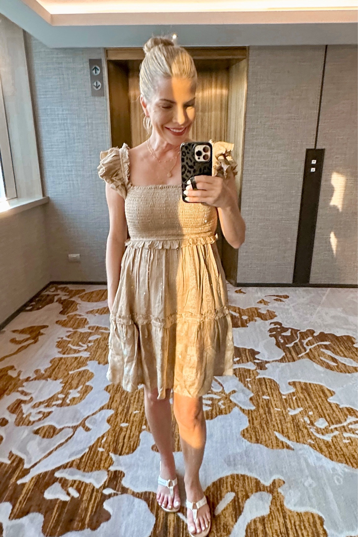 My cute neutral dress is back in stock and it’s adorable! I’m wearing it in Thailand and love the lightweight fabric. It’s the perfect neutral tone and the smocked bodice with the ruffle sleeves is adorable. I’m wearing an XS/SM. It runs tts and doesn’t stretch a ton. 
My slides are a favorite I’ve worn for years from Lilly Pulitzer in diff colors. They run tts and they’re a comfy height. 🤍


#LTKshoecrush