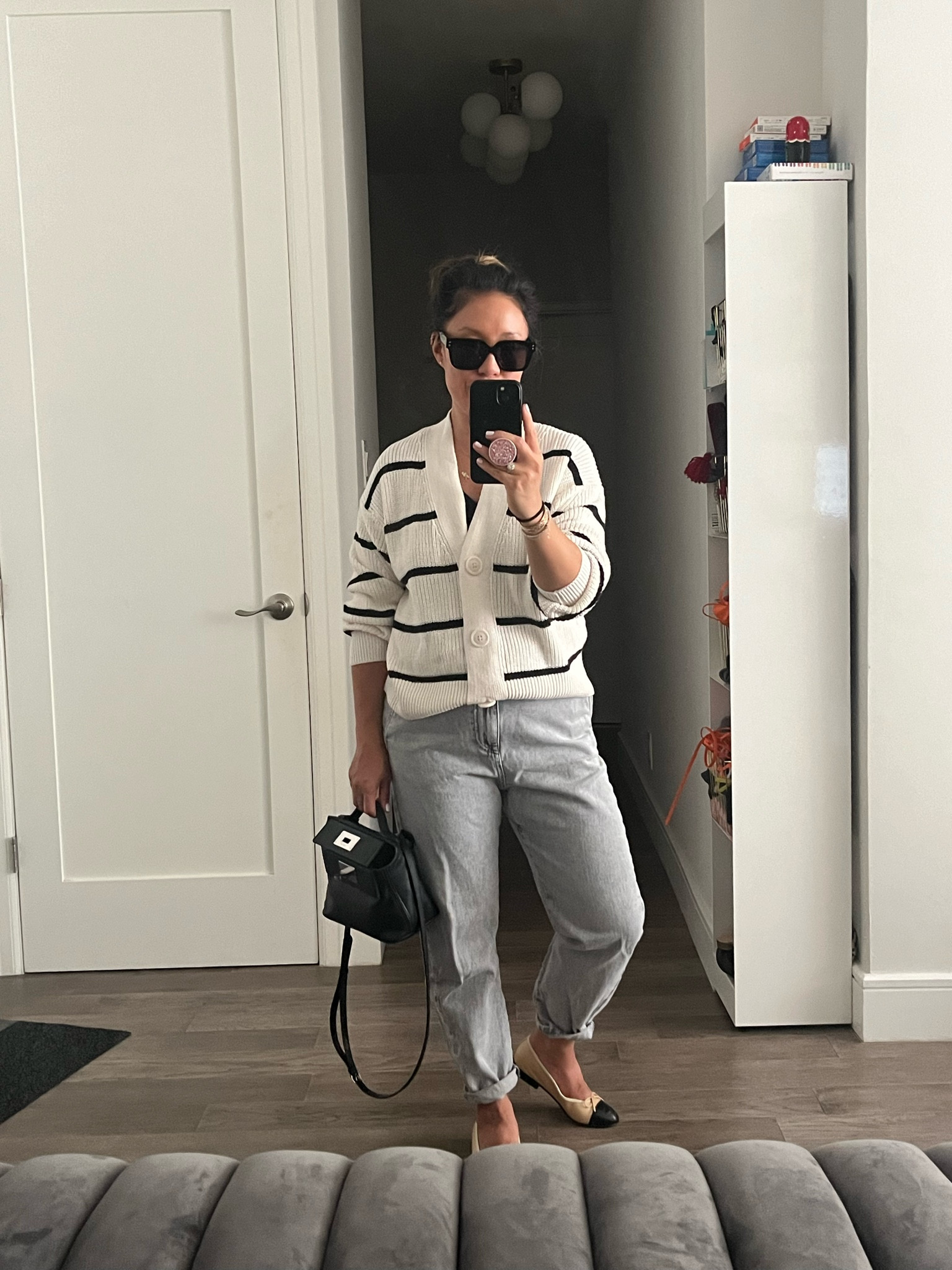 Layer up. Cardigan sweater. I’m wearing an xs. Jeans are from the Zara sale. 

#LTKItBag #LTKFindsUnder50 #LTKShoeCrush