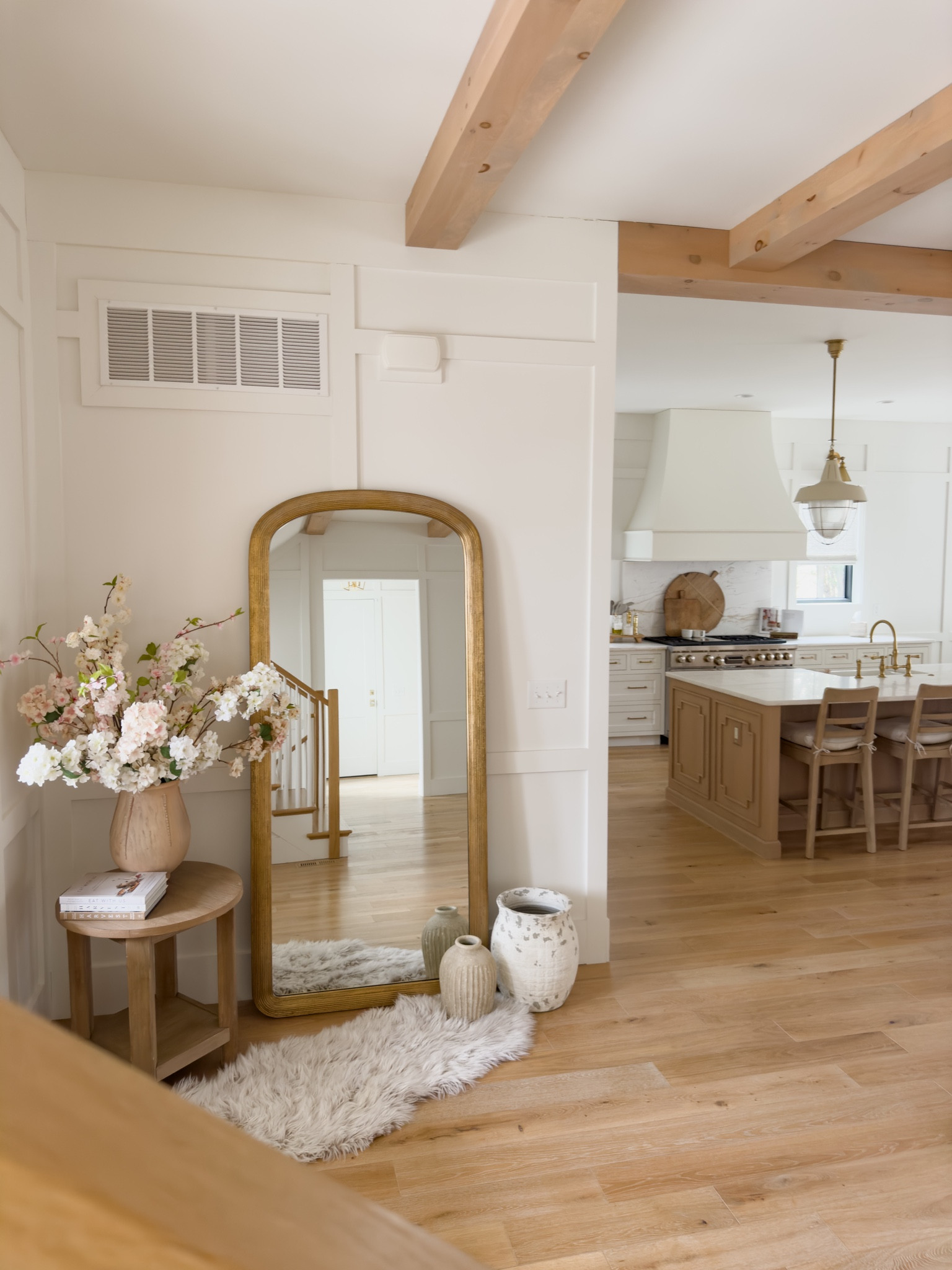 Spring entry way details with pops of pink, neutral wood tones, and cozy warm white details. Currently loving the faux fur rug in front of my mirror for added texture and warmth

Spring home, spring entry way, home refresh, furniture favorites, wooden furniture, floor mirror, gold detail, Pottery Barn style, found it on Amazon, faux florals, textured vases, rug details, decor book, light and bright, pops of pink, spring refresh, shop the look!

#LTKSeasonal #LTKhome #LTKstyletip