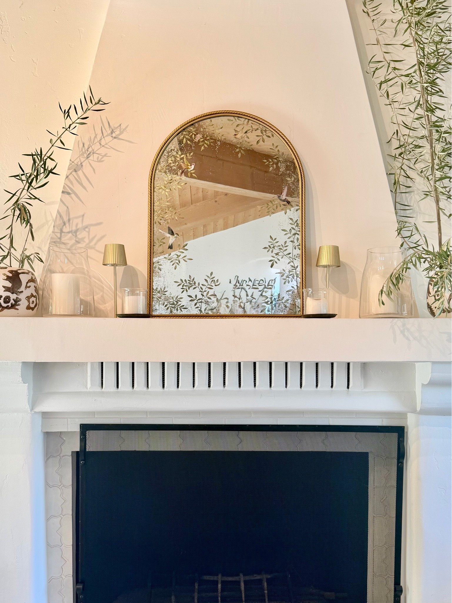 I decided to do a little mantle refresh🍃

I swapped out a rectangular picture that didn’t fit the space very well for an arched mirror, I added faux olive plants, and a few candles for a natural look.🍃

#homedecorlivingroom
#homedecor #interiordesign
#amazonhomedecor 
#homedecore

#LTKgrwm #LTKSaleAlert #LTKHome