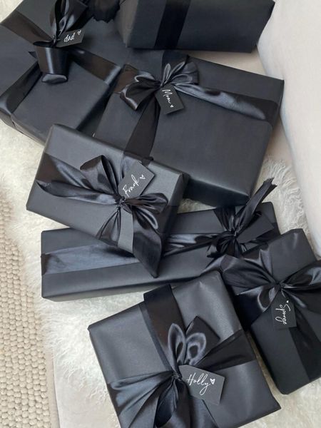 GIFT WRAPPING DETAILS 🖤✨ follow @hollyjoannew for home and style! Glad you’re here babe xx

Holiday | Christmas | Gift Wrap | Gift Giving Ideas | Gift Guide | Black Luxury Gift Wrapping | Monochrome Holiday Gift Wrap | Birthday | Corporate Holiday Event Gift Wrap | Holiday Party | Satin and Paper Aesthetic 

#LTKhome #LTKHoliday #LTKGiftGuide