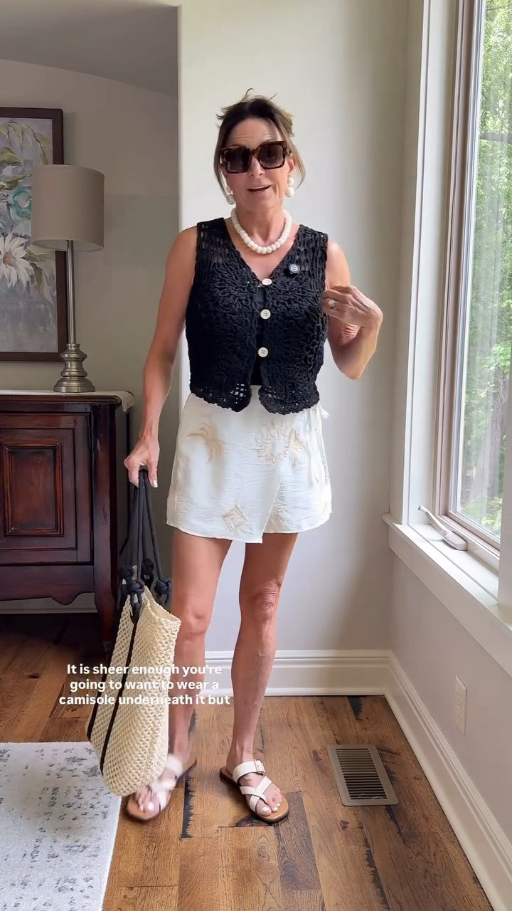 Simple summer style doesn’t have to feel boring.

A textured vest, embroidered shorts, neutral sandals, and woven accessories create an outfit that feels polished without trying too hard.

#summerstyleover50 #over50fashion #vacationstyle