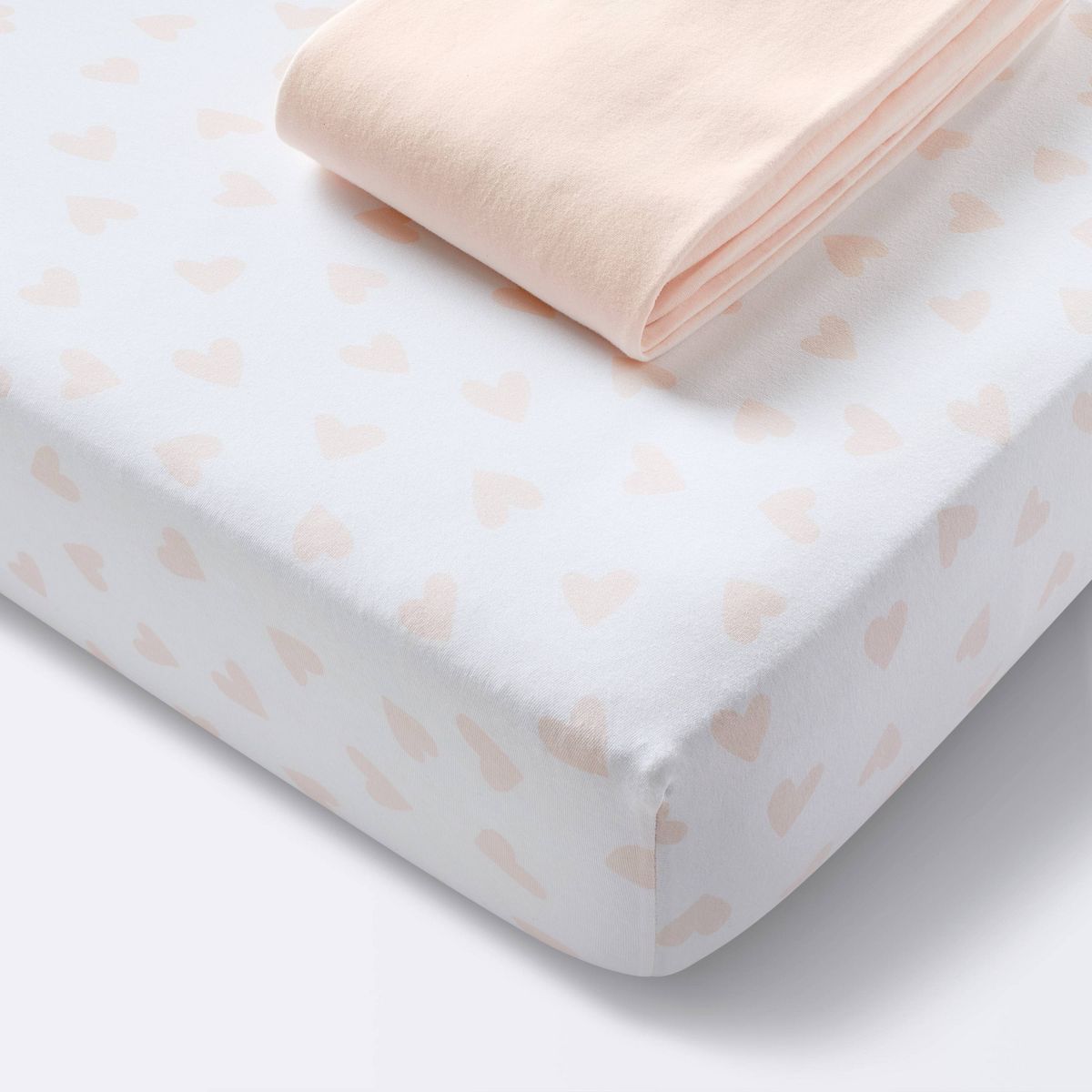 Jersey Fitted Crib Sheet - Pink Hearts and Solid Pink - 2pk - Cloud Island™ | Target