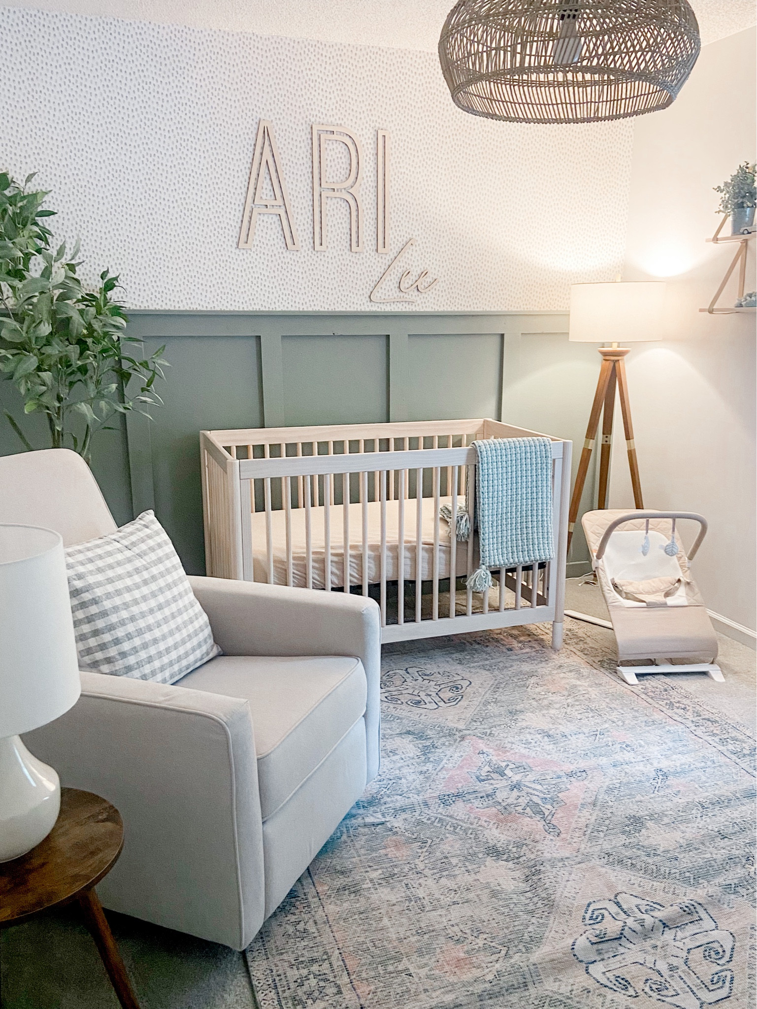 I’m in love with the nursery for our baby boy on the way!

Gender neutral nursery
Sage green nursery
Crib
Swivel rocker
Nursery rug
Nursery decor
Baby bouncer 
Nursery wallpaper
Nursery lighting
Nursery shelves
Nursery name sign 

#LTKhome #LTKbaby #LTKfamily
