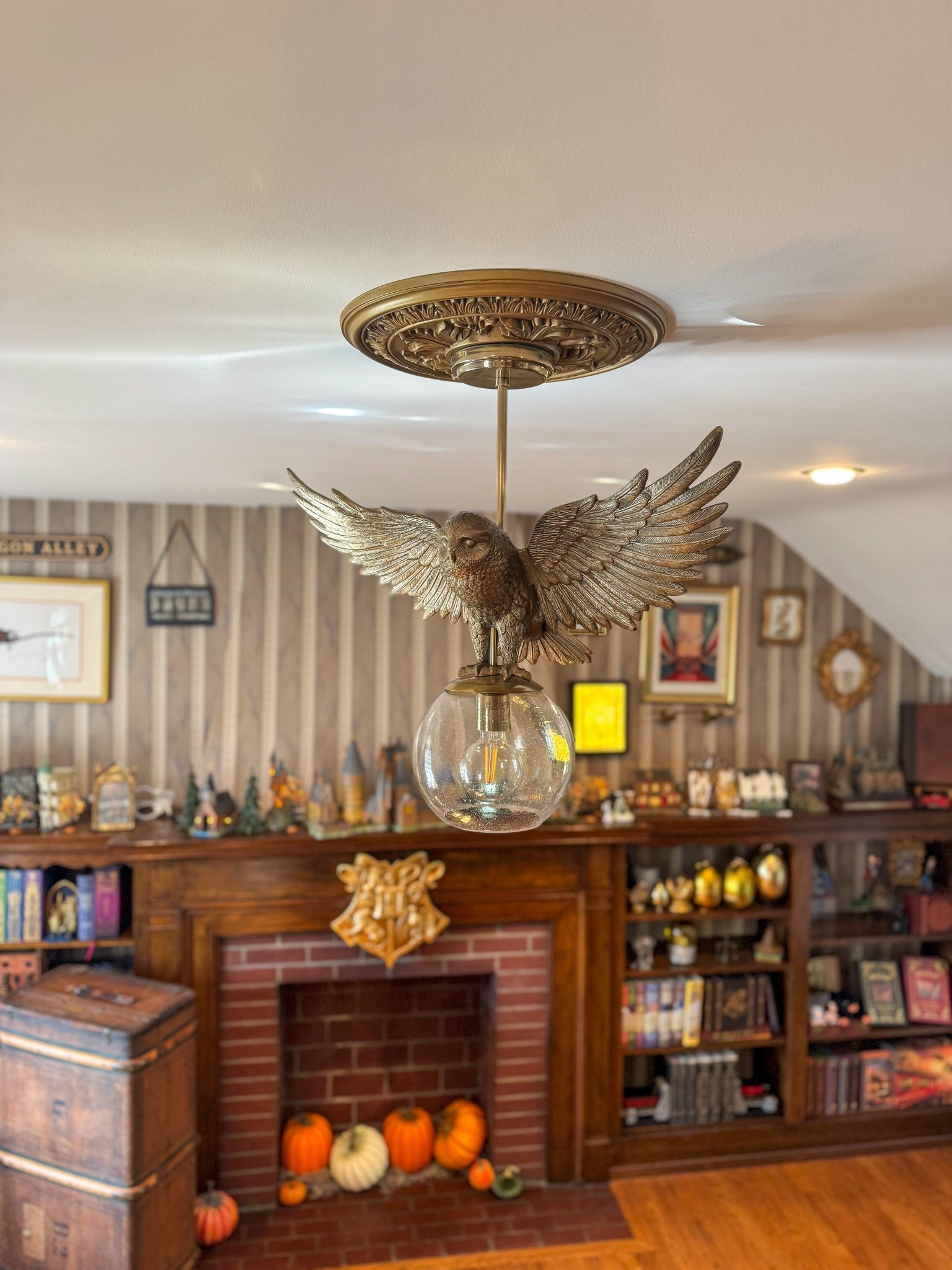 Until I have the energy (and budget) to tackle the wallpaper, this will do 😂

I’ve had this light fixture sitting in a closet since we moved. It was actually my very first big Harry Potter purchase, but it lived in a condo we used as a rental, so I never got to enjoy it myself.

I loved the drum light that was here before, but there’s no denying this Hedwig pendant is iconic. It’s exactly the vibe I wanted for my office.

Both light fixtures are from @potterybarnteen 

The Hogwarts drum light has been discontinued, but the Hedwig pendant is still available on their site. It usually goes on sale about once a year like most major Pottery Barn pieces, so keep an eye out. I’ll share if I see it! 🕯️✨

#hedwig #harrypotter #harrypotterstyle #hogwarts #roomofrequirement #wizardingworld #wizardingworld #potterybarn

#LTKHome #LTKFamily